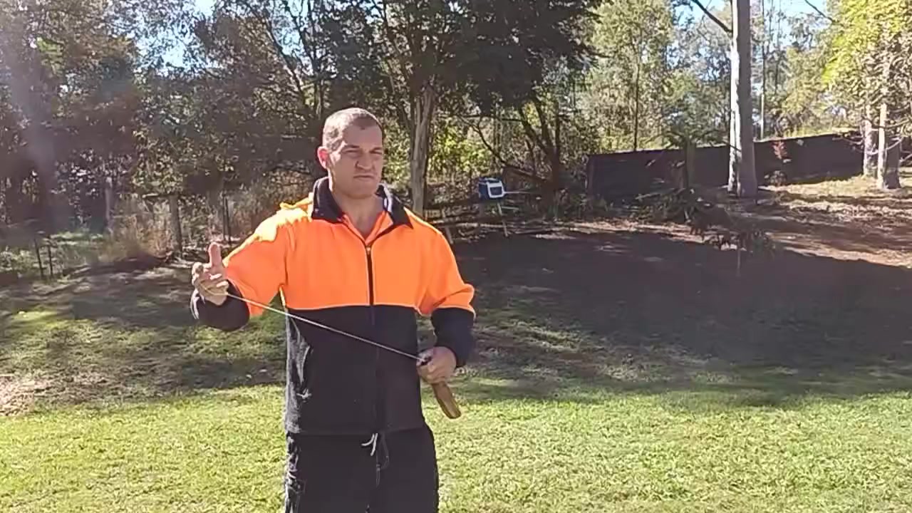 Black wattle bull roarer hand made and painted by Skeenarang Booma