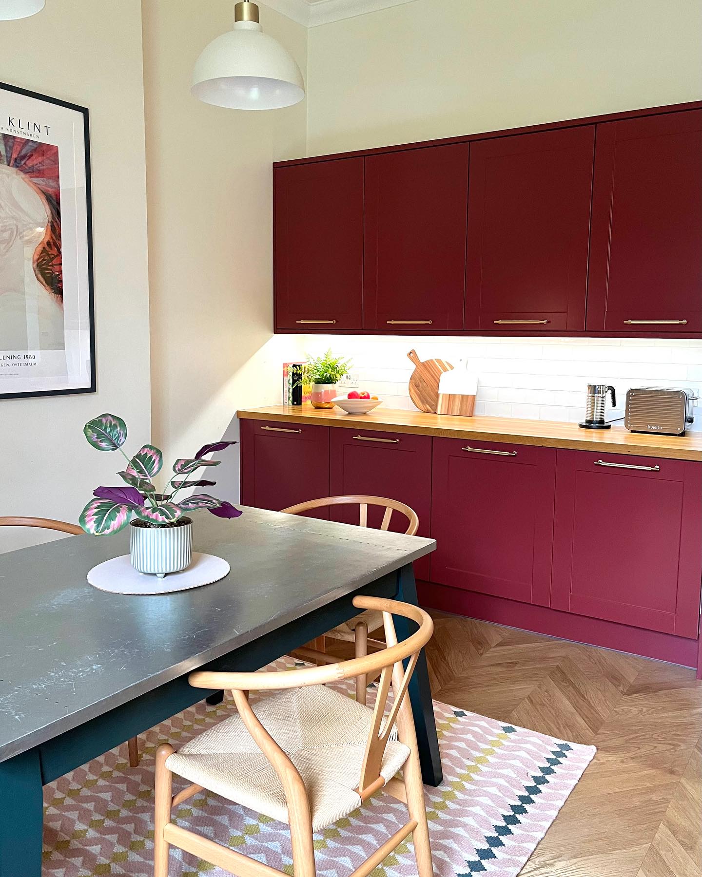 When we moved into our house 8 years ago absolutely everything needed updating. At the time I was so overwhelmed with all the choices I needed to make that I chose a very safe white, Shaker style kitchen from Howdens. We have loved our kitchen but as time has moved on, I’ve felt I really want something with a little more va va voom!
Never in a million years did I think I’d be a red kitchen kind of person but when I was looking at colour samples from Farrow & Ball, this red (called Eating Room Red) just felt right in the space. Our kitchen is north facing and the depth and warmth of this colour just seemed to work so well. I was considering painting the units myself but feared I would probably make a total pigs ear of it and it would chip over time. I contacted @thesprayfactoryltd for a quote and within a week the doors were off and it was all systems go.
3 days later I am the very proud owner of a red kitchen, and I love love love it! The finish on the cupboards is beautiful and very hardwearing and it absolutely looks like a brand new kitchen but at a fraction of the cost.
I chose brass knurled handles from @thehandlestudio which I think work so well against the red. I also bought a new rug from @swooneditions and chose two new prints from @pstr.studio
If anyone is thinking of giving their kitchen a makeover and has any questions about getting their units sprayed and how the process works, please feel free to DM me.
Happy weekend all 😊