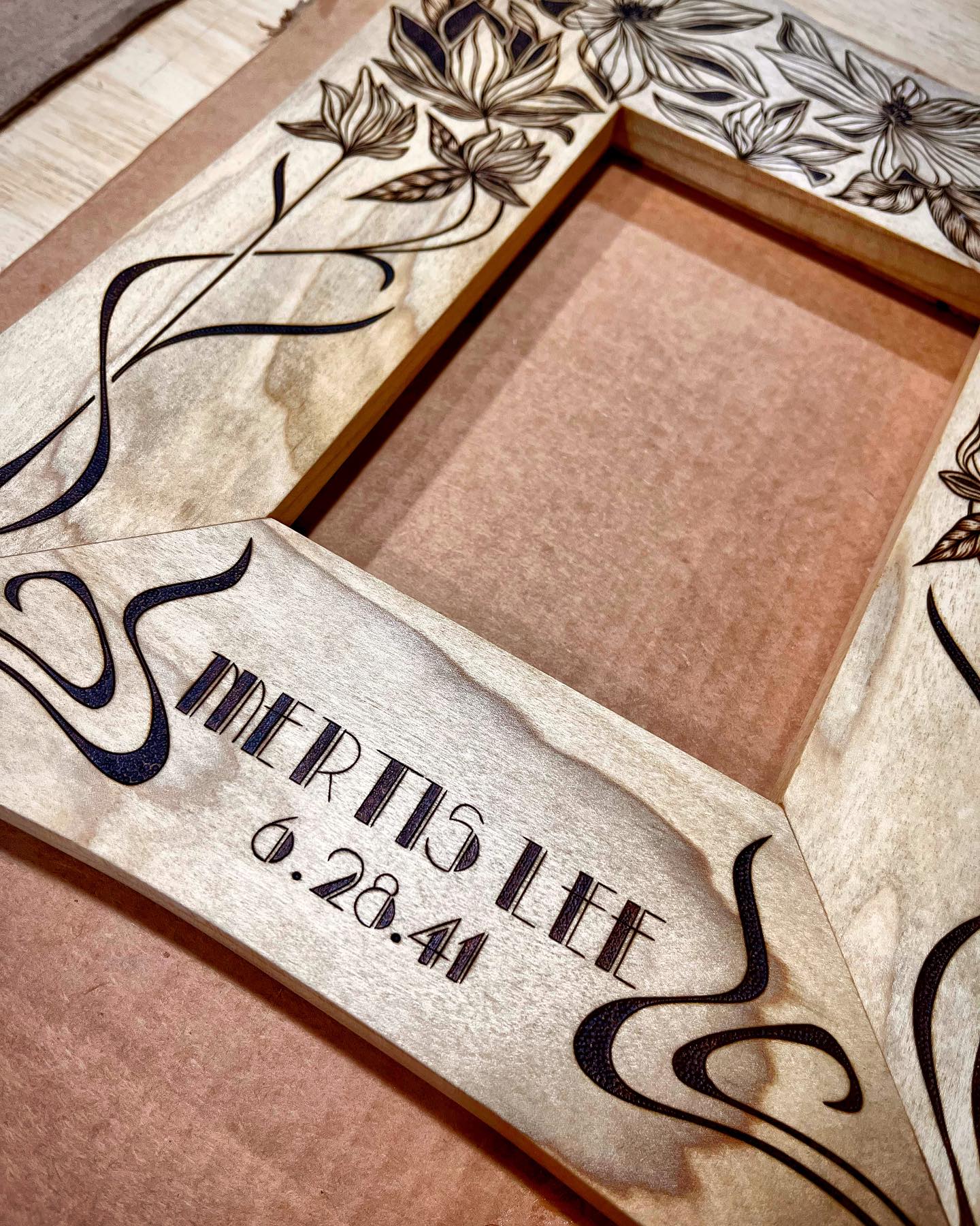A custom order frame I recently completed. Art nouveau elements with magnolia flowers. Love this font, I think I’ll be using it more 🙌🏽
.
somehow I forgot to take a final pic of this piece 🤣 #hustling
.
.
.
.
.
.
.
.
.
#kcapurasdesign #pyrography #pyrographyart #pyrographyartist #woodart #woodartist #woodburning #woodburningartist #woodburningart #woodporn #burnedbyhand #freehand #artnouveau #artdeco #lettering #handlettering #woodcraft #originaldesign #oneofakind #femalewoodworker #naturalstyle #homedecor #statementpiece #frame #pictureframe #wallart #artofinstagram #michigan #localartist @razertip @odiesoil
