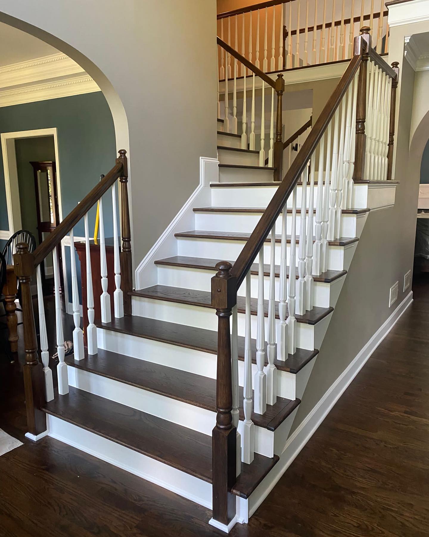 Introducing our stunning full stair remodel! We replaced the old hybrid pine and carpeted treads with solid oak, beautifully finished with an espresso stain. All spindles were removed and replaced, while the Rails were refinished from gold to espresso. The risers and stringers were painted for a seamless look. Check out the transformation and share your thoughts!
#StairRemodel #HomeRenovation #StaircaseTransformation #OakTreads #EspressoStain #Refinishing #SpindleUpgrade #RailsRefinishing #HomeImprovement #InteriorDesign #beforeandafter