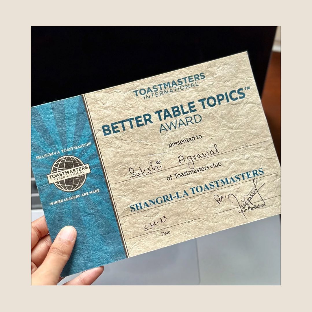 My first Toastmasters’ meeting.
Last week, I attended the Shangri-La Toastmasters as a guest for their "Flashback to the 90's" theme. The session commenced with introductions, followed by pre-prepared featured speeches.
Next came the Table Topics segment, where members and guests were given impromptu topics and had to speak for 1 to 2 minutes. And being a shy and introverted person, I had no plans to get up there and speak in front of the crowd. But there was a twist (because every great story needs one). They decided to determine the speakers by playing a game of passing the parcel. Fortunately, I was spared in the first round. However, luck was not on my side in the second round, and the parcel landed in my hands.
My topic was “If you were paper, what would you like to be before being trashed”. I chose to speak on origami. And I fumbled and scrambled through the entire one minute. Nonetheless, I was proud of myself for speaking up.
When it was time for the awards, I didn't have high expectations of winning since I believed the other two Table Topics speakers were better than me. But to my surprise, I won the “Better Table Topics” award. I was both surprised and elated that the people in the meeting believed that my speech was the best.
After attending this Toastmasters meeting, I realized that with some training and support from fellow members, I could enhance my public speaking and communication skills. Thus, I have decided to become a part of the Toastmasters community.
#toastmasters #toastmastersinternational #nepal #nepaltoastmasters #toastmastersclub #sakshireports