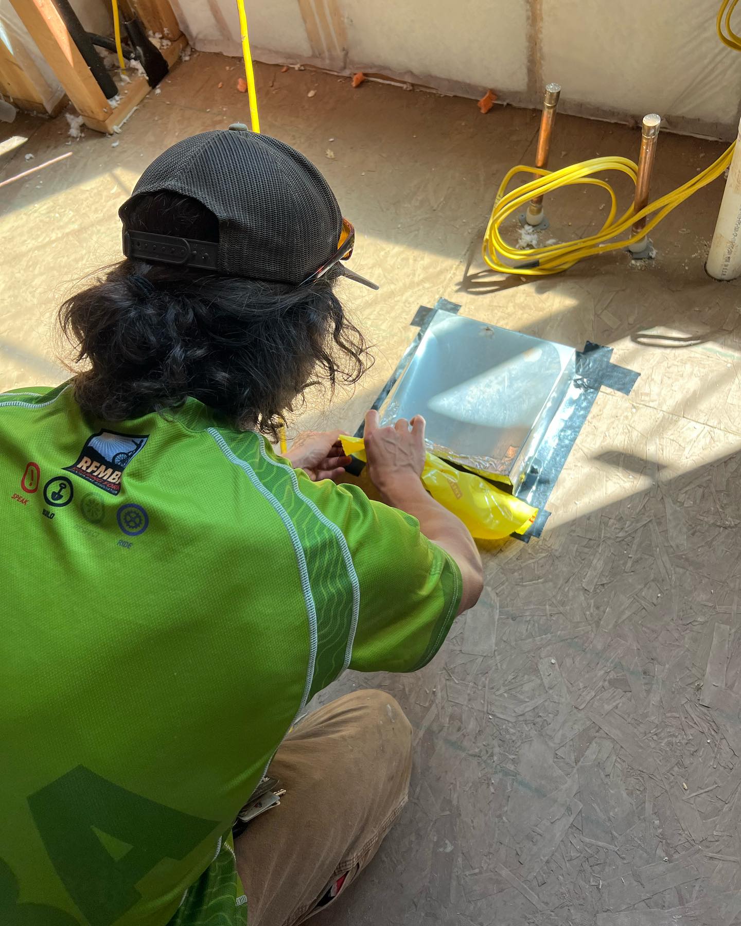 Usually we’re building ‘em, but sometimes we’re testing them too… Elan tightening up for a duct leakage test last week.