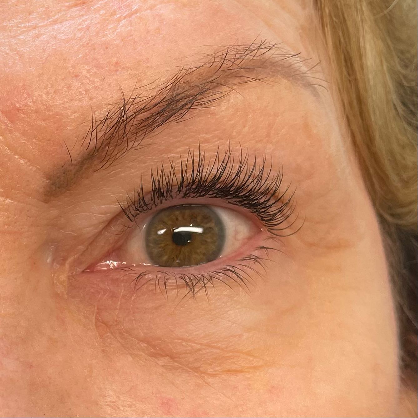 A little LIFT 🚀 for these gorgeous green eyes!
New lashes for a new client today—
This client had extensions on previously (not by me) and let them fall out naturally (I do not recommend). She had a few sparse areas but I’m hopeful by her next appointment we’ll have some nice regrowth since we used some .12 & .10’s classic lashes for these new extensions.
Did YOU know that you can actually GROW your natural lashes with extensions? It’s a common misconception that extensions damage natural lashes. Let’s face it— anything too heavy and long will most likely cause damage. However, using thin, light and short extensions can actually keep lashes HEALTHY! If you look really closely you can see here I only went about 2mm longer than her natural lashes. This will give them room to grow out with ease 💫😍
Excited to see these babies thrive! And that smile! Says it all. Thanks for coming in Kim 🫶🏼