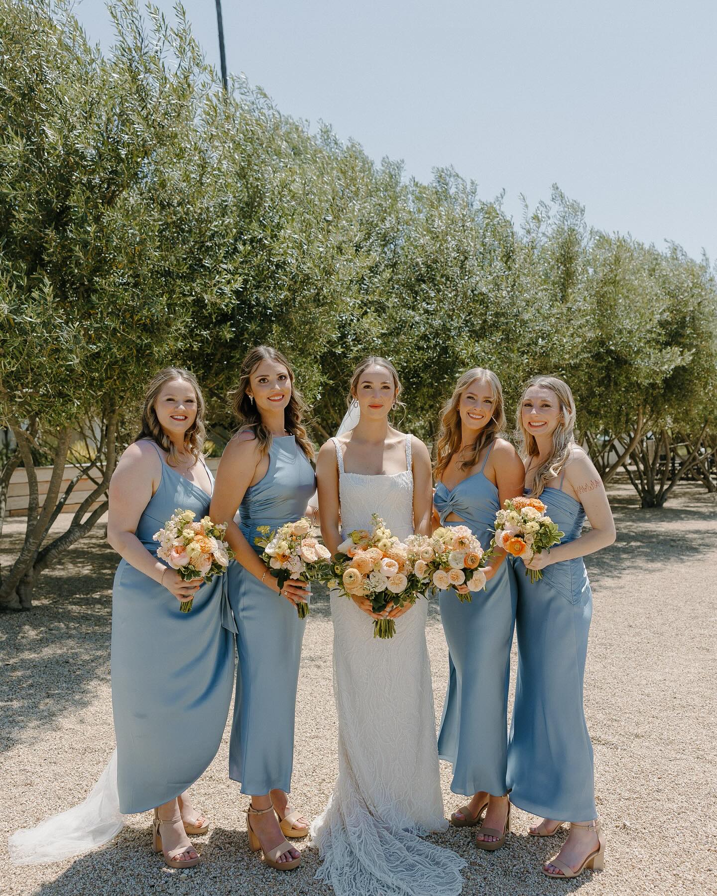 Dusty blue accents paired with spring colors is becoming one of my favorite palettes ๐
Photographer: @christab.photography
Venue: Biddle Ranch @biddleranchvineyard
Planner: Kaylyn Brower; Bundle + Bash @bundleandbash
Florals: Brooke Edelman Floral @brookeedelmanfloral
Hair & Makeup: The Queen's Bees @thequeensbees (makeup: Amber Boaz @trueblushartistry ; hair: Kayla Guitierrez @braids_waves_and_bridal
Signage: Shelby LeMarquand @canvasandco.events
DJ/Musicians: Epic Entertainment @epicentertainmentinc
Rentals: All About Events @allaboutevents ; Avenue Twelve @avenuetwelve
Catering: Old SLO BBQ Co. @oldslobbq
Bar Service: Bottles & Ice @bottles.and.ice
#summerwedding #california #californiawedding #citruswedding #peachbridalbouquet #blushbridalbouquet #yellowbridalbouquet #luxurywedding #winerywedding #centralcoastcalifornia #sanluisobispowedding