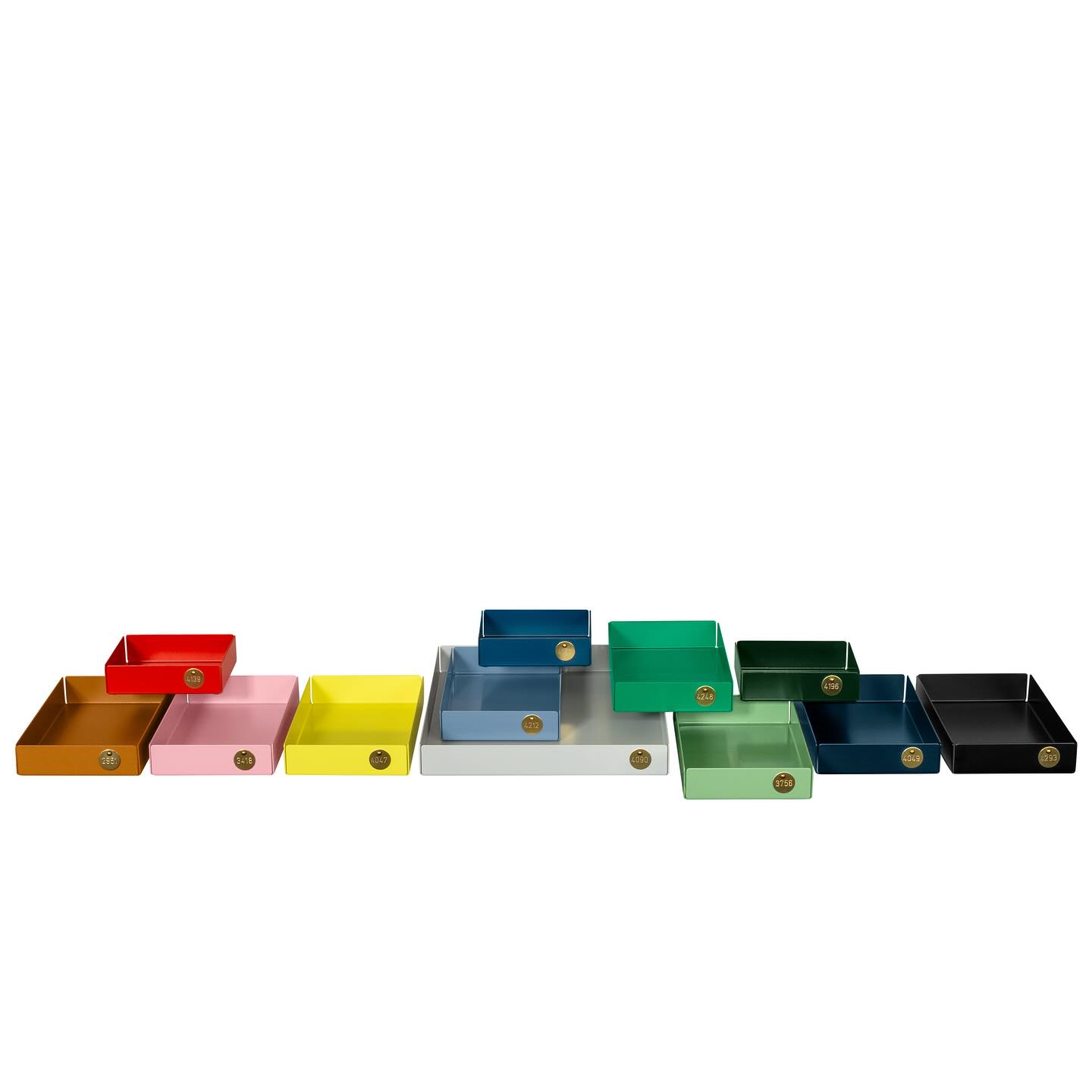 POI TRAYS - THEY COME IN 4 SIZES AND 12 COLOURS
Point of Interest is the name of the small trays made of thin, folded steel. With POI, everything finds its suitable little box, whether it’s jewellery, a handful of paper clips, papers or a tangle of unravelled cables. The POIs can be arranged next to each other, combined with each other. Each POI tray is numbered and unique – reminiscent of the analogue times of archiving. Designed and manufactured in Hamburg. Link in Bio.