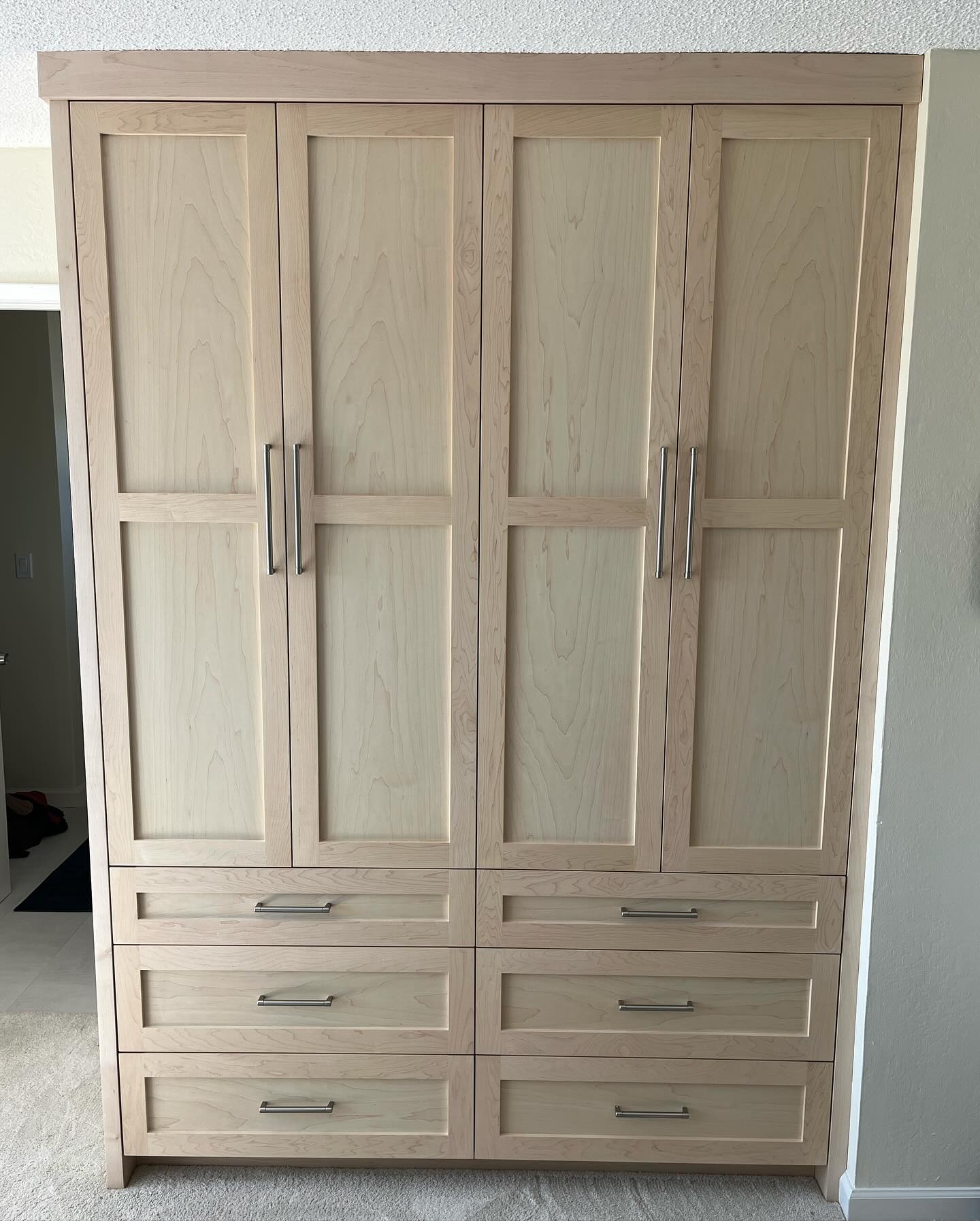 Some large Maple closets from a few months back. They were a struggle to get up the stairs and cleared the ceiling by just 1/4”. But they settled in just fine!