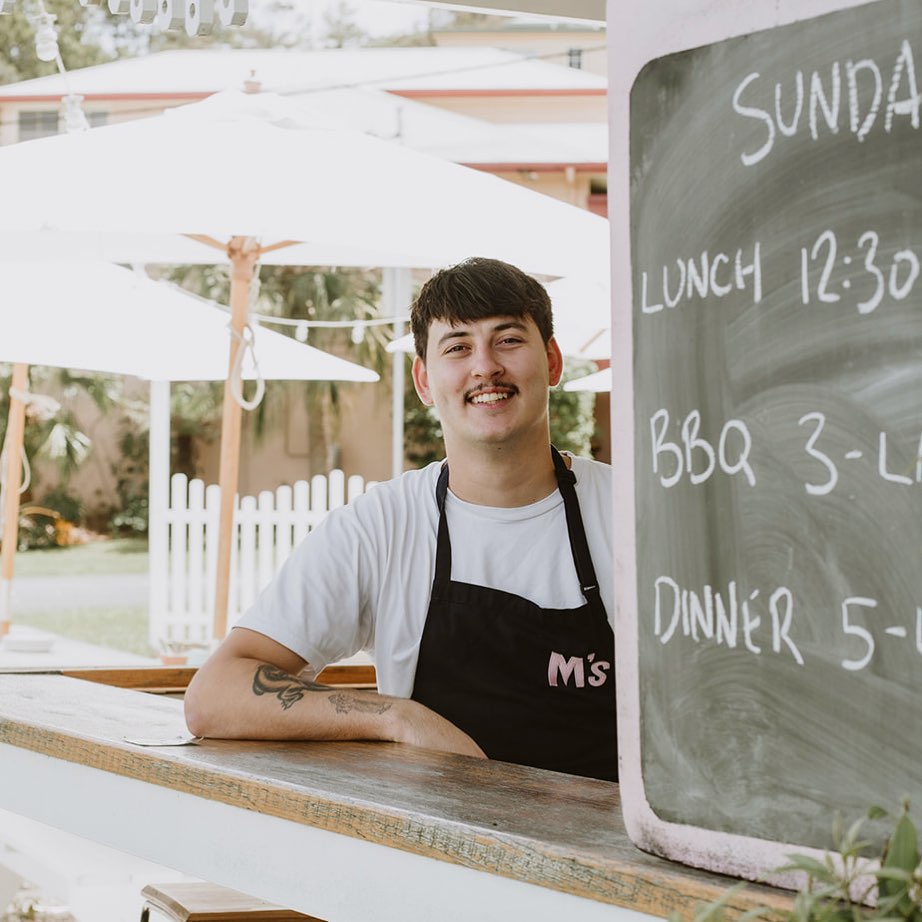 Matilda’s will open on January 26 to raise funds for the @mujaay.ganma foundation and their work in establishing and growing the native nursery in Bowraville. Cooper Nugent will be cooking up a storm on the backyard BBQ utilising local native ingredients. The Matilda’s team will be donating their time with all profits from the day going towards the Mujaay Gamma Foundation.
With the success of last year raising over $6000 we contributed to a small expansion of the nursery infrastructure including an upgrade to our irrigation system at its current location. The native plants are now for sale at the Nambucca Farmers & Makers Market, started by Matilda’s. Patrons of Matilda’s helped the team with a small grant application which was also successful.
We will be open from 7-12 for pastries and coffees, 12-2 for lunch and then again from 5pm-Late. The following specials will be available from 12pm-2pm & 5pm-Late or sold out:
Scallops with lemon aspen caper butter + sea parsley pangrattato $5
Crocodile mince stuffed chicken wings with pickled sea blight, native mint $24
Chargrilled QLD prawns with lemon myrtle, black garlic aioli, sea grapes $22
BBQ figs with macadamia cream, native thyme, strawberry gum salt $20
Davidson Plum Spritz, local davidson plum, native pepperberry, triple sec, prosecco, soda $18
*Public holiday 15% surcharge will apply.
Bookings Reccomended