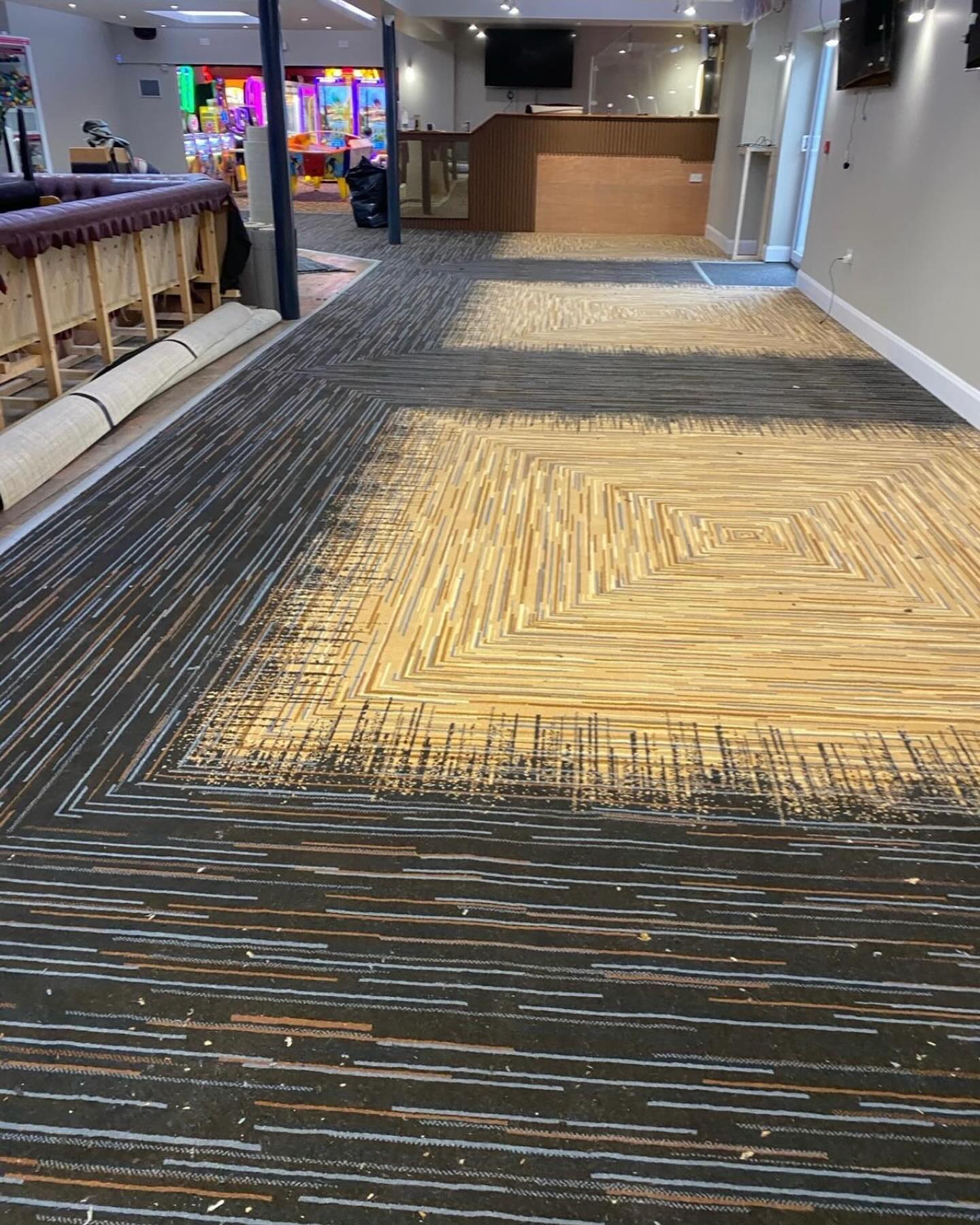 Holiday Park clubhouse in Clacton gets a posh new revamp. Traditional woven Axminster Carpet with integral woven inserts known in the trade as a Chlidema.