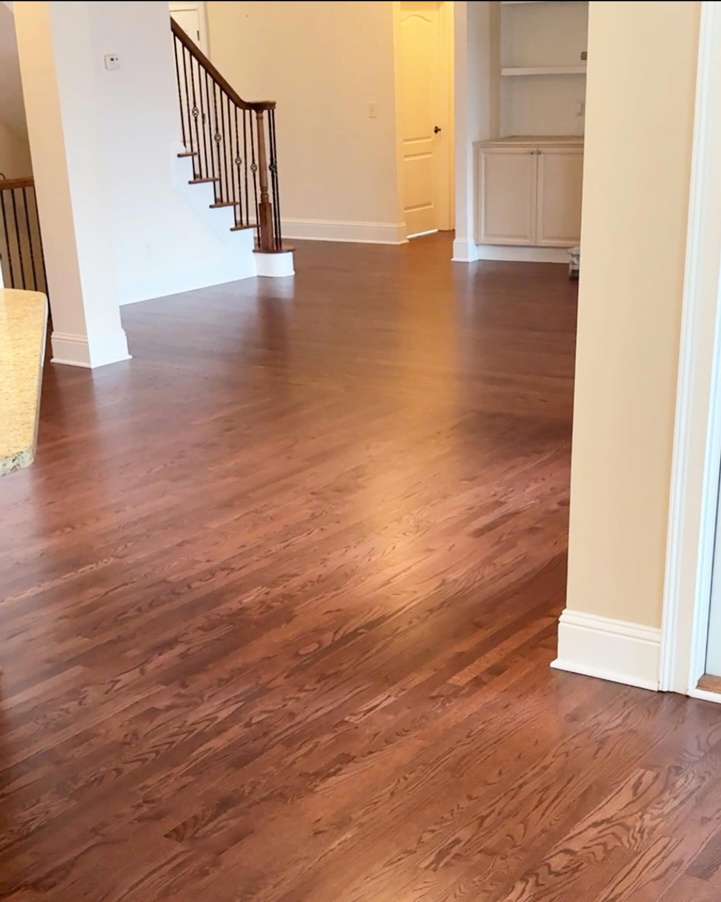 Beautiful Red Oak stain over red oak hardwood planks. Finished with Bona Clear Sealer and HD Traffic.