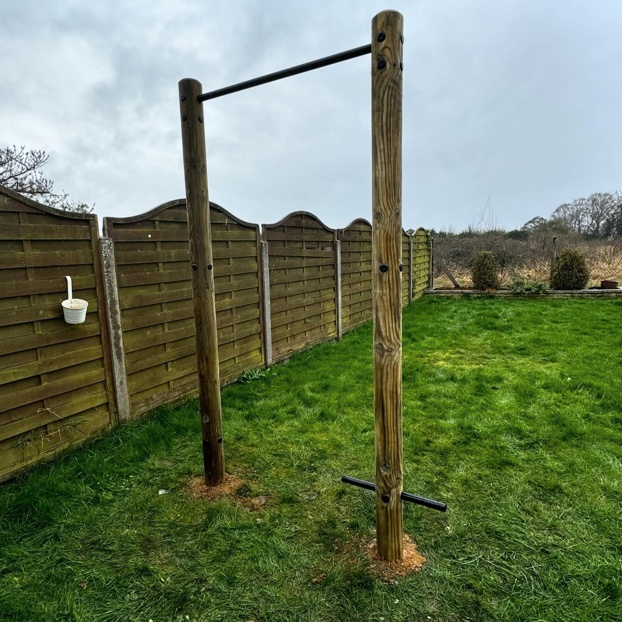 Installation of a pull up bar with step up for @josh__butina today. Looking forward to seeing this in action #pullups #calasthenics #outdoortraining #gardengym