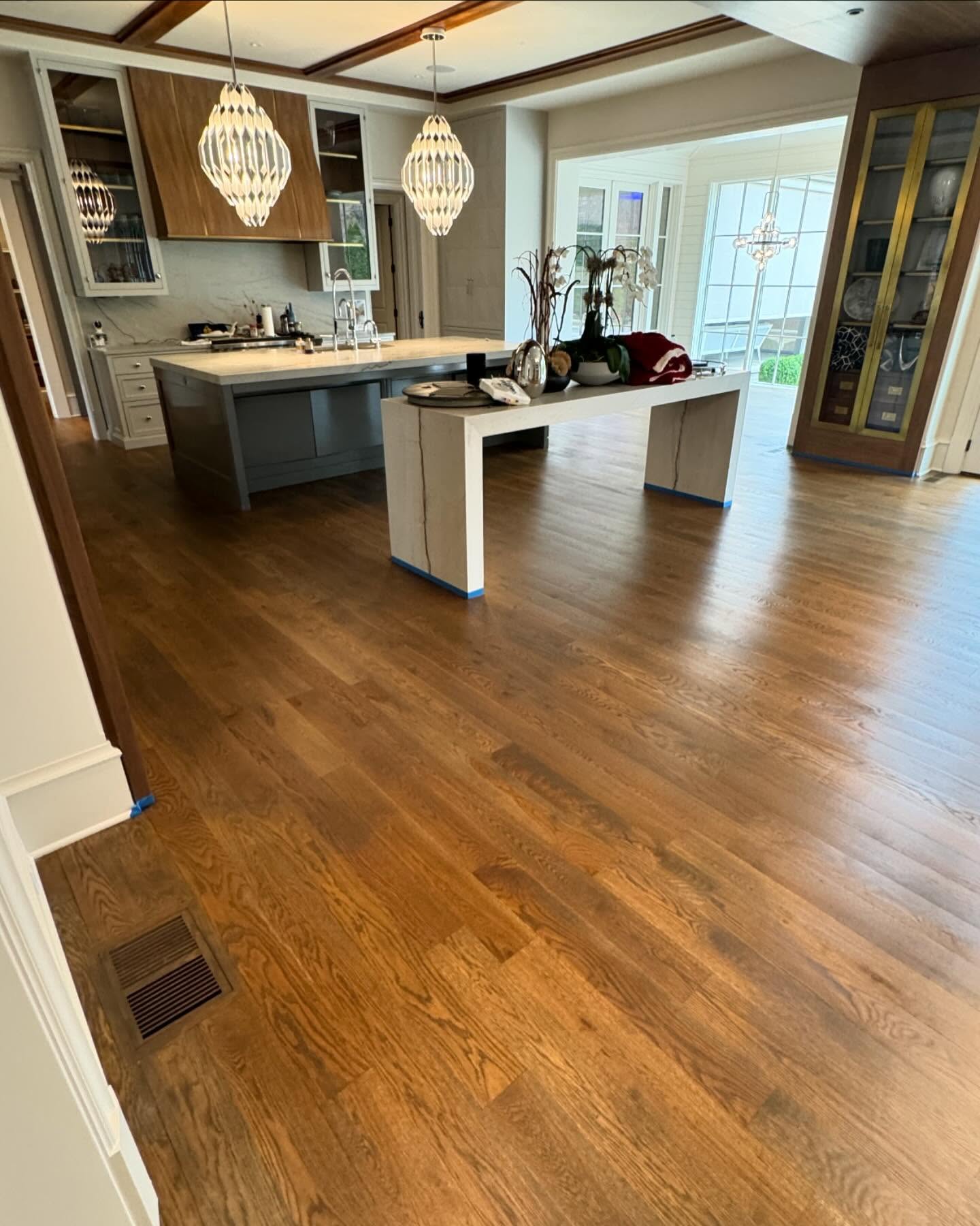 Stunning Rubio maintenance coat just applied. This color, Savanna by Rubio, made this older floor brand new after a mechanical scrub, and then the new application of finish. After six years of heavy traffic, these floors were brought back to life. It’s definitely one of my favorite colors and the ultimate high-end floor finish.