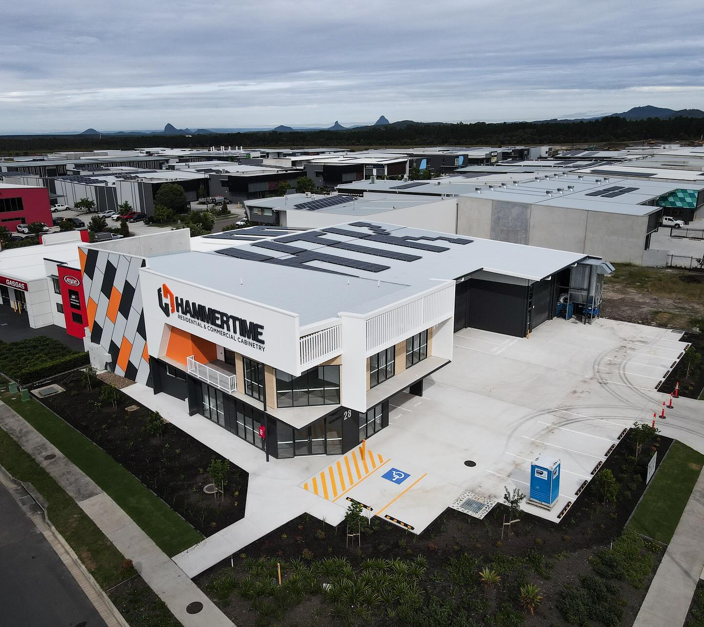New 887sqm build for @hammertimekitchens in Baringa. Hard to miss this one when you’re driving into Aura! Creative touch with the solar panels.