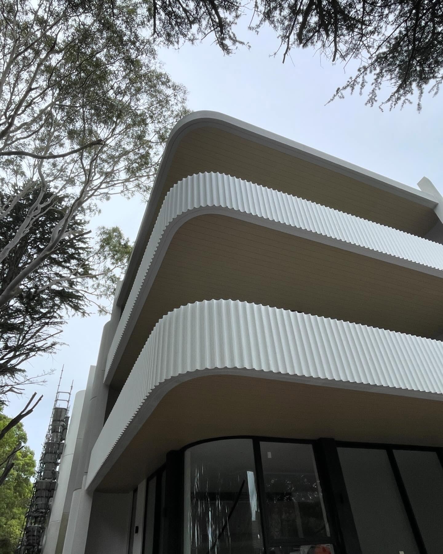 Fluted concrete upstand walls formed using foam mouldings within conventional formwork supplied by Bespoke Formwork. #bespokeformwork #flutedconcrete #flutedconcretewalls