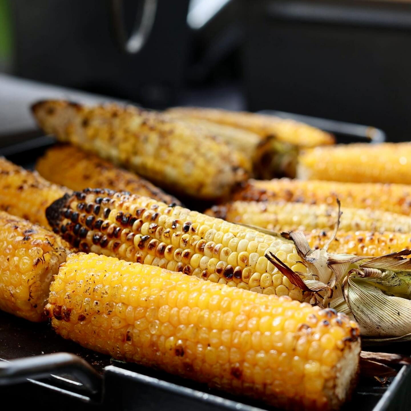 The ultimate side dish: golden, charred corn on the cob hot off the grill! Flavor explosion guaranteed ๐ฝ๐