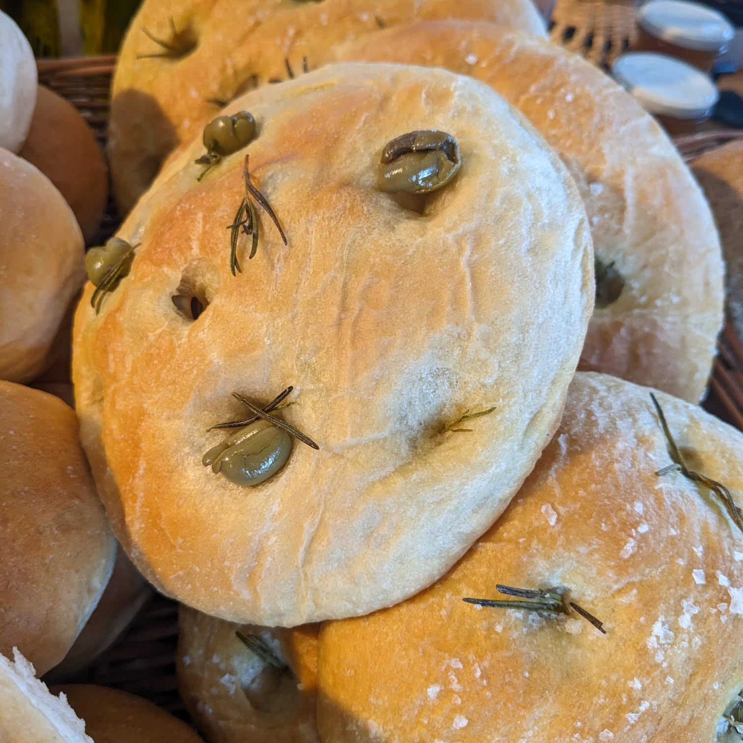 We have 2 yummy new breads especially for today! An olive focaccia and a sun dried tomato and cheese focaccia!