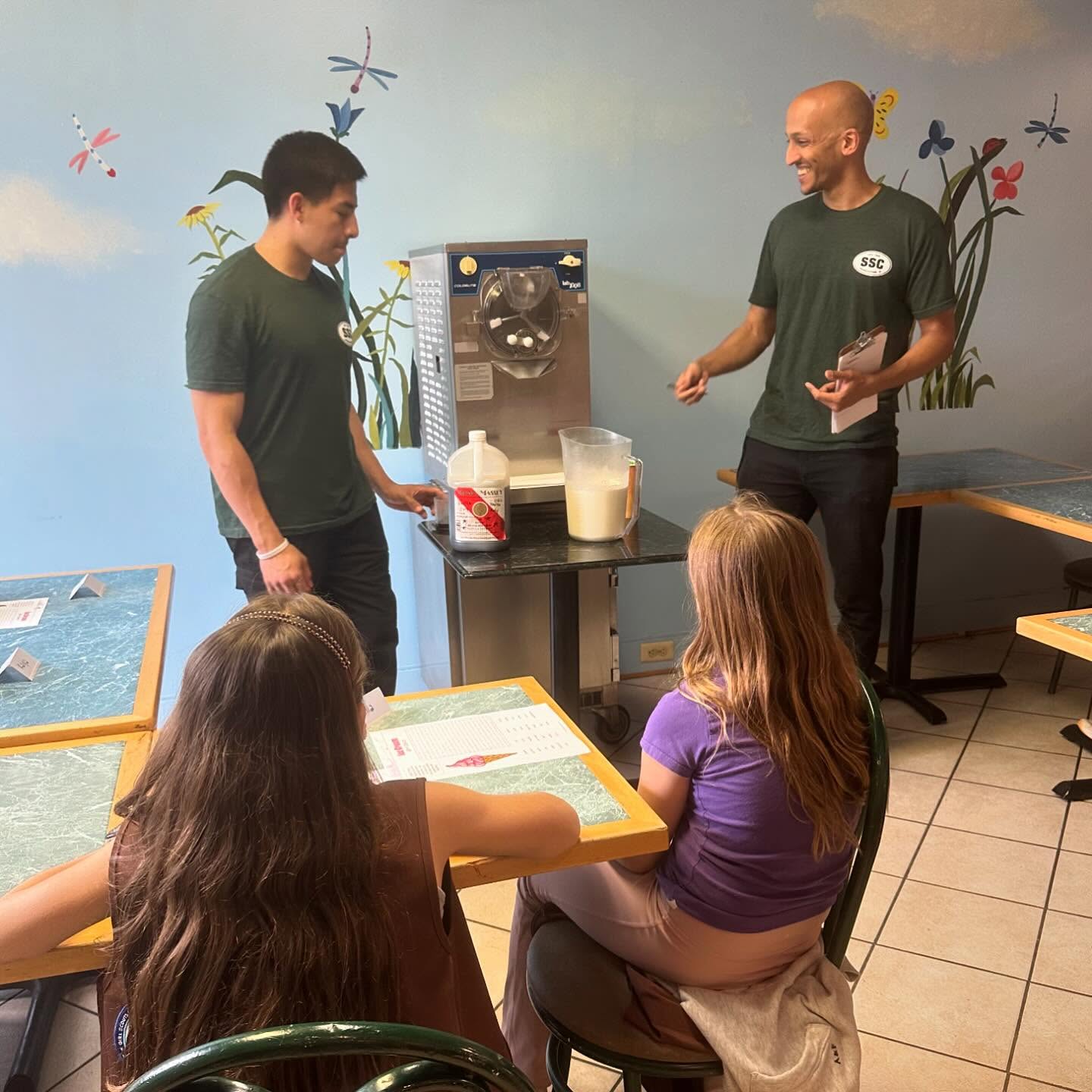 Bluey Berry? Sprinkle Tornado?? Rainbow Blast??? What will they think of next?
A huge shout-out and thanks to the third grade Girl Scout Troop from Thomas Jefferson Elementary who came in last week to learn how we make ice cream! We had a blast running our ice cream tutorial for you and seeing what wild flavor combinations you all were able to come up with during our demonstration. We hope you enjoyed your different flavor creations, and we hope you’ll stop by again soon to redeem your kids scoop gift cards!🍦💚