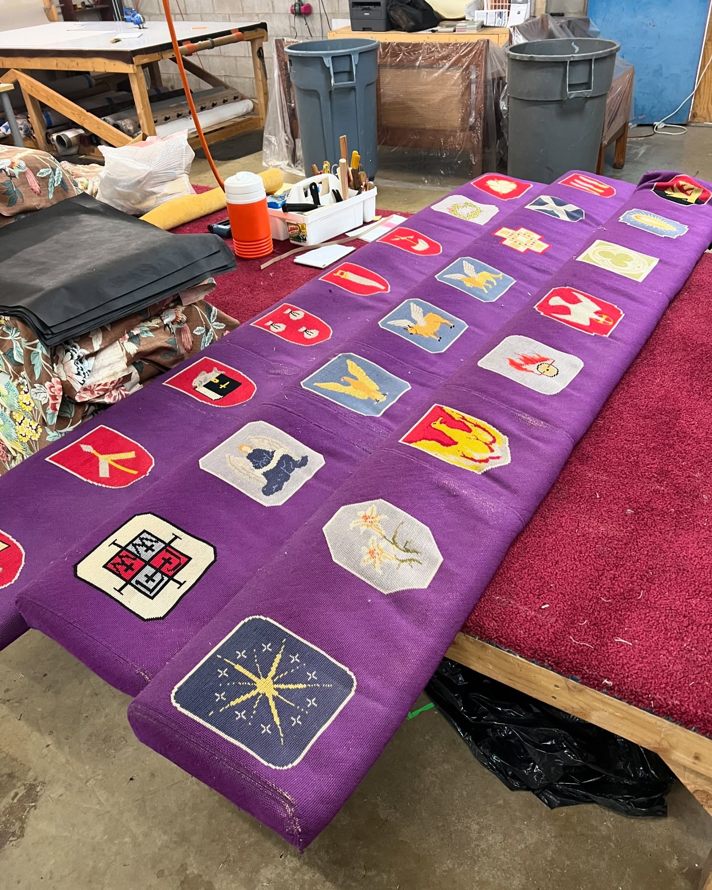 The parishioners of St Patrick made this fabric special for the church’s kneelers. Now that the kneelers need new foam the church reached out to us to ask if we could possibly preserve the fabric while bringing them back to life. All the other upholstery shops either turned them down or said they’d only be able to put on new fabric. When they sent photos and I saw this needlepoint work it was just so sweet and special we had to say yes! We’re so happy we can help keep something so special around for more years of use!