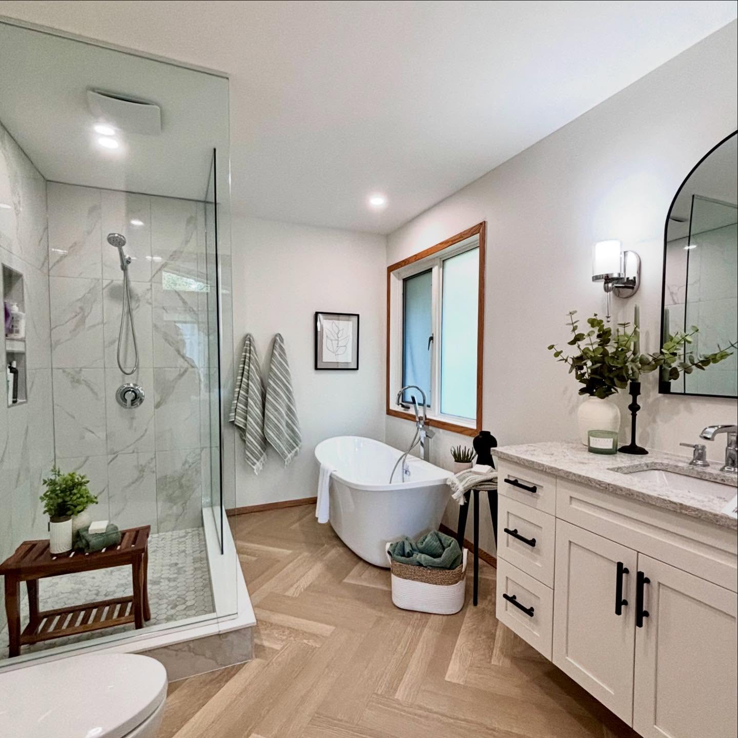 Super pumped to deliver our fourth bathroom update this year!
Designing bathrooms is very much about function. It’s so important to ask the client: How do you use this space? What are your priorities? What are your storage needs? Habits? Etc.
Nearly every design can be delivered at nearly every budget…it’s all about high/low, smart exchanges and knowing where to spend!
A hardwood chevron was not in the budget, but the look and feel didn’t need to be compromised. We found very good vinyl and spent the money on quality custom cabinetry that will stand the test of time.
A larger shower was subbed for an unused bidet and a much more modern (and easier to clean!) stand alone tub was installed.
Resale value and every day function was maintained while a whole lot of pretty was added!
When it comes to styling? We always make sure toilet brushes, garbage cans, toothbrush holders, qtip holders and the like are paired with candles and plants. It’s about living in and loving your space - beautifully!
I’m always honoured by my clients’ trust and patience through the design and reno process. Having beautiful people to design for is honestly a dream come true!
💙🩵
- Kelly
(204) 918-6023