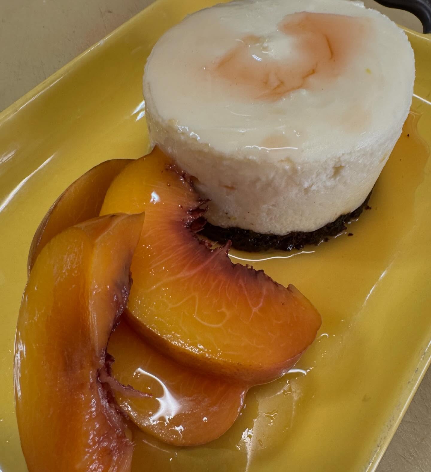 Cheesecake with lavender scented poached peaches @copperkettlecafe
