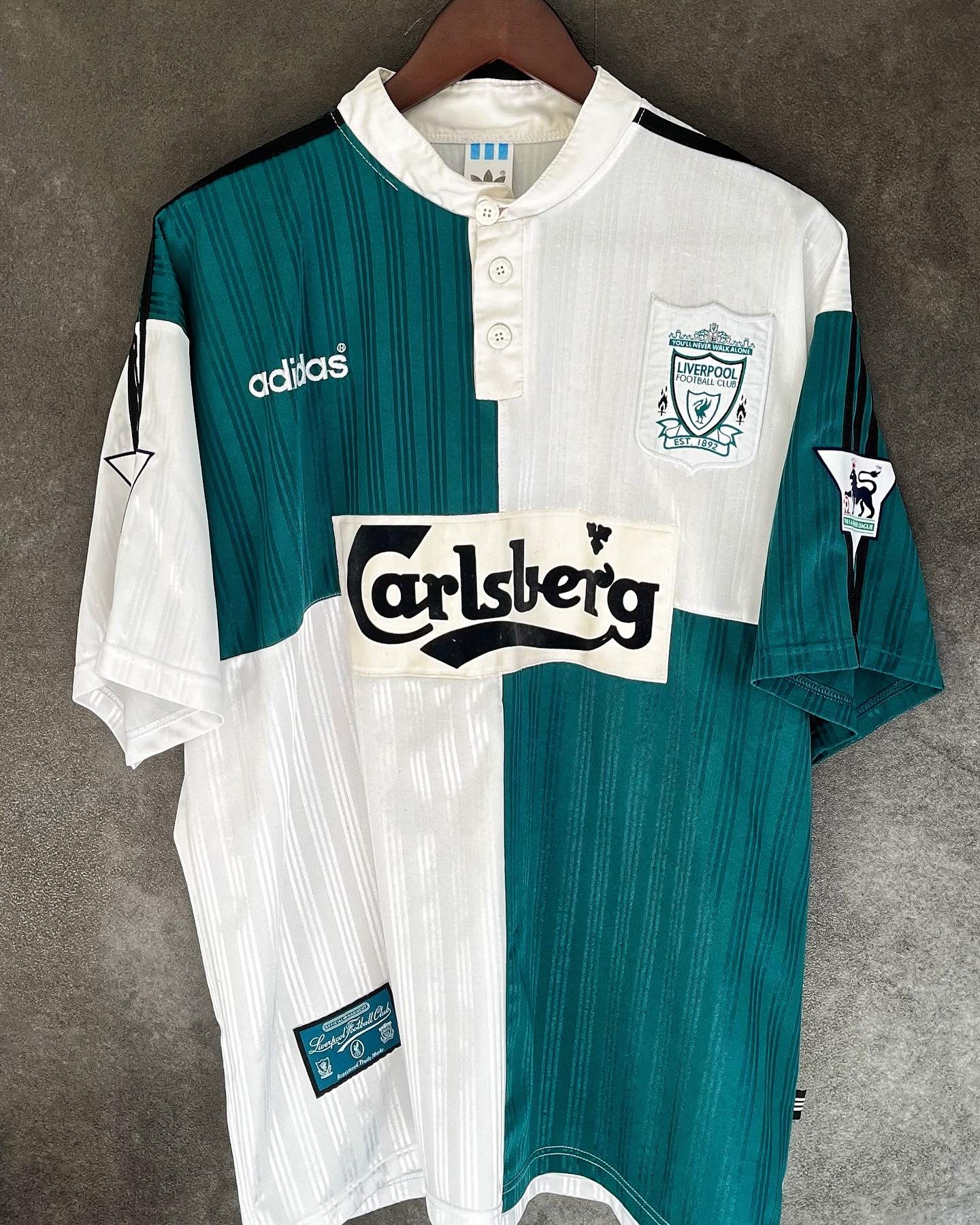 Liverpool FC 1995/96 Away by @adidas
Featuring Robbie Fowler 23
Still having the hangover of the post Daglish era
The Reds had a tough season despite record signing Stan Collymore from Nottingham Forest for £8.5 million
Finishing 3rd in the premier league behind Newcastle and Man United
Losing the Final of the FA Cup to Man United and exiting the league cup to Newcastle
One Diamond in the rough was a young Robbie Foeler who came into the first team as a potential Replacement for Ian Rush who had left on a free to Nottingham
Fowler scored 36 Goals in all competitions with 28 of those coming in the league, just missing out to Alan Shearer for the Golden Boot
The Shirt itself has a similar template to that of the famous Newcastle jersey with the Grandad Collar
I love the way it looks like it’s been patched together from old jerseys
The Carlsberg sponsor that has been stitched onto front looks amazing
The Nameset is fantastic too with a really nice Vinyl finish
#liverpool #merseyside #premierleague #facup #retro #vintage #icon #footballshirt #football #trikot #collection