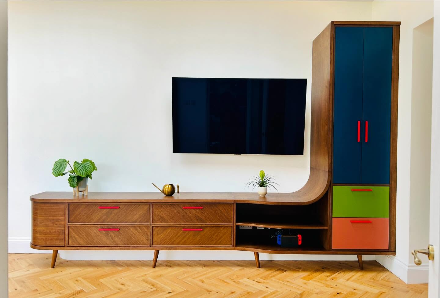 Mid century inspired media unit. Walnut and Formica.