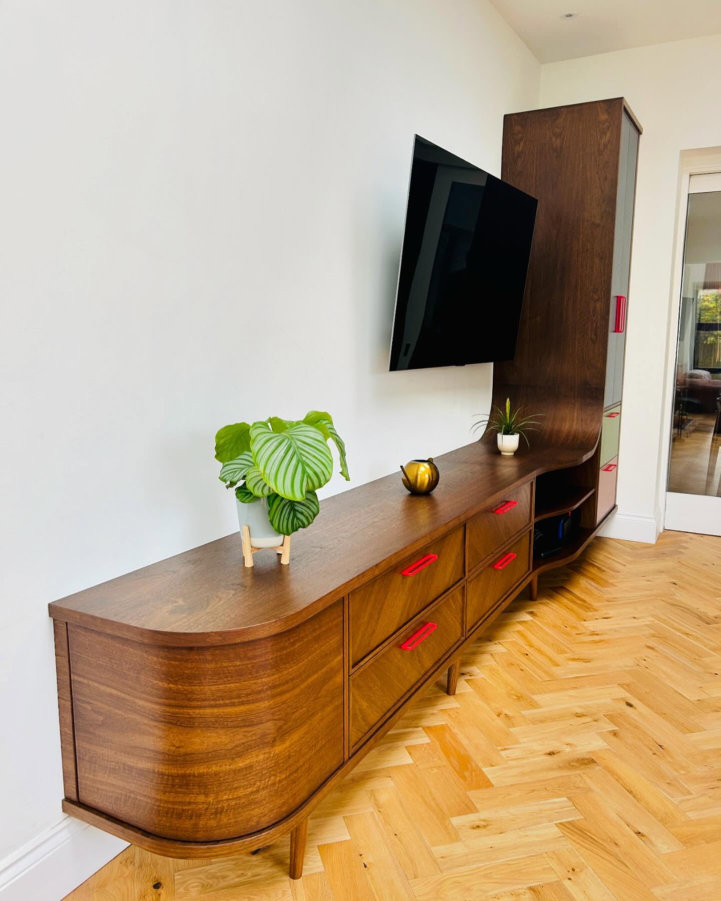 Mid century inspired media unit. Walnut and Formica.