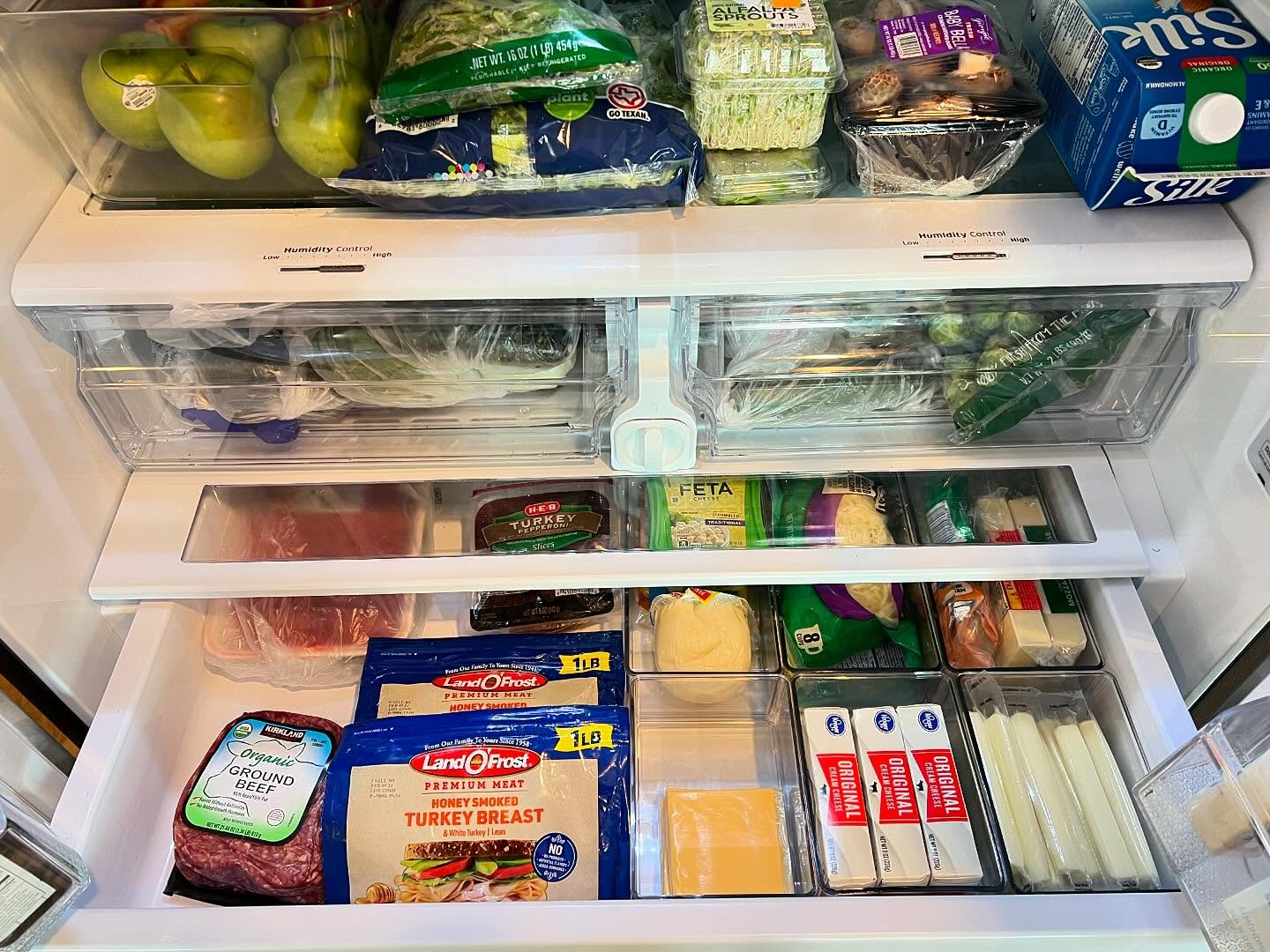 Not too often do we get to organize the fridge along with the kitchen. We made sense of the existing drawers and shelves and added a few bins to the bottom drawer to help keep all the cheeses accessible and from getting lost in the back. Looks so much neater and also makes it easier to grab and go.