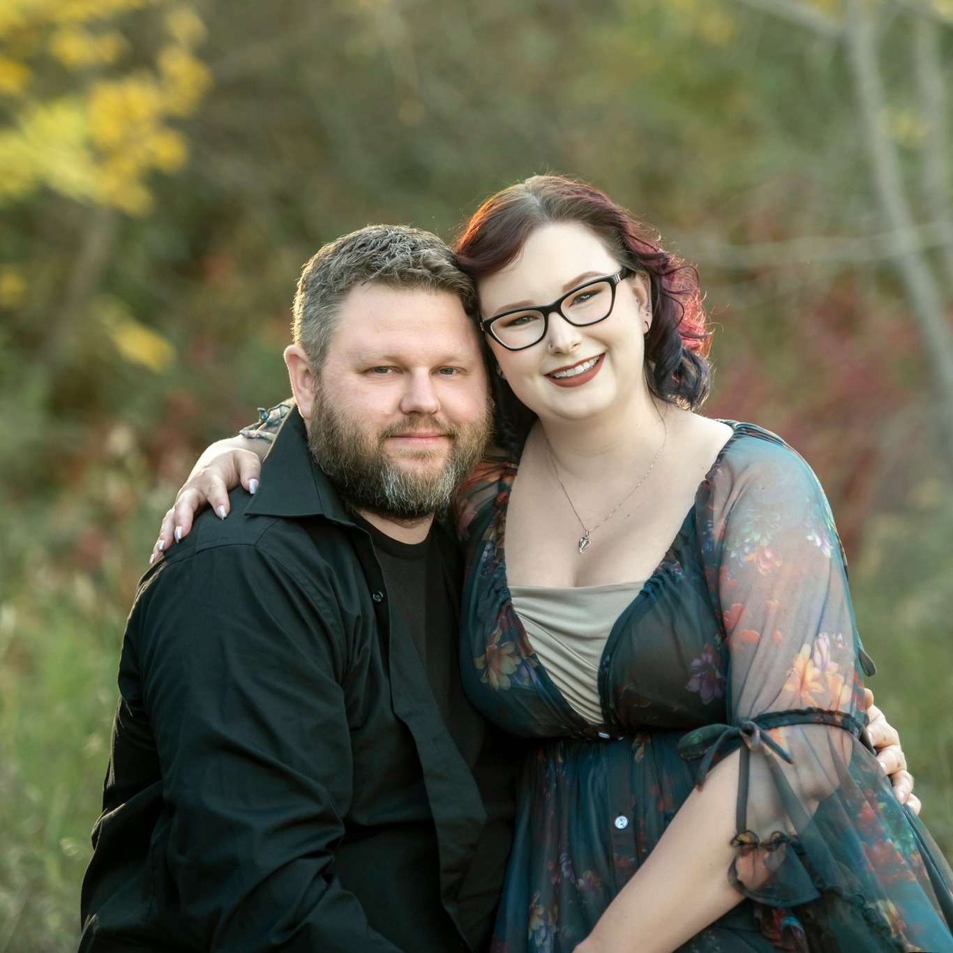 I am so obsessed with our anniversary photos from @ginasportraits! She never disappoints!
And this is the very first time I've ever utilized my Client Closet myself! I LOVE this new navy dress!
This is also a great example of how to coordinate outfits for a session. Brenden wore black and khaki (solids and neutrals), because I was wearing a navy pattern. The nude slip I wore to give the dress more coverage (since the fabric is on the sheerer side), matched the colour of Brendenโs pants. The trick is to wear complimenting colours and mix patterns with solids.