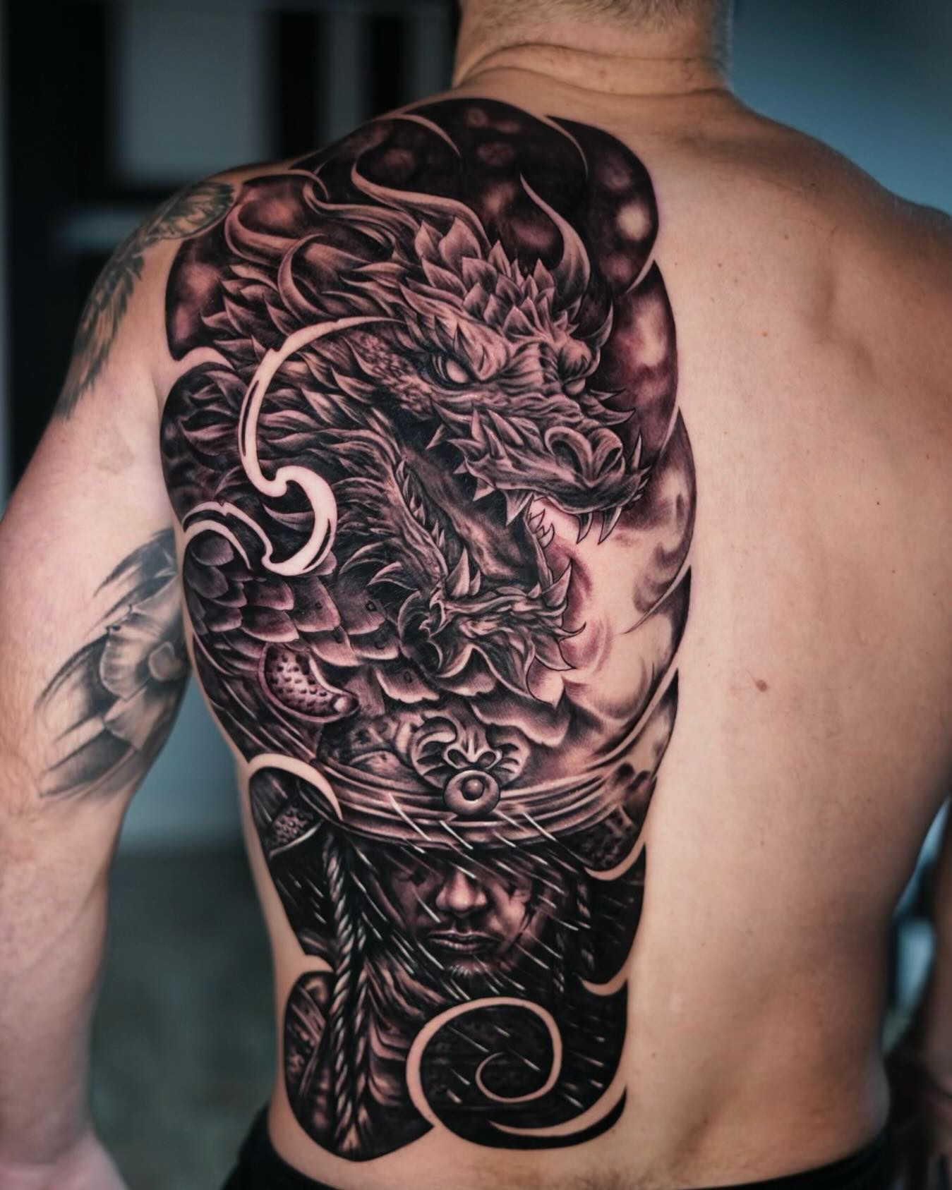 The power of mind!!! Such a beautiful pice done in two days.
.
#tattooart #tattooartist #tattooideas #inkedup #tattedup #trending #tampatattoos #tampatattooshop #blackandgraytattoo #inklovers #tatt #backpiece #dragontattoo #samuray #samuraytattoo