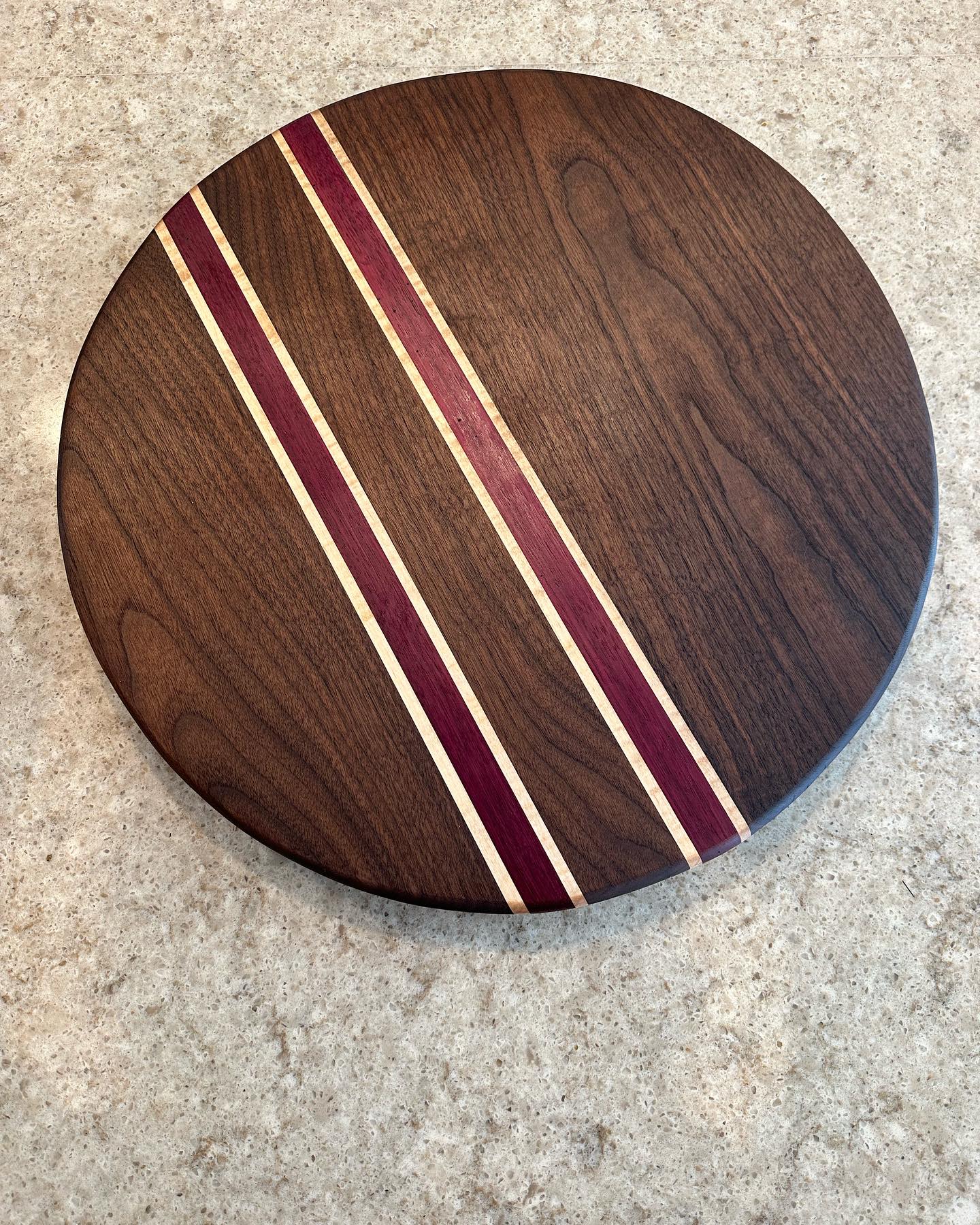 22.5 inch diameter Lazy Susan in English walnut with maple and purpleheart walnut accents.