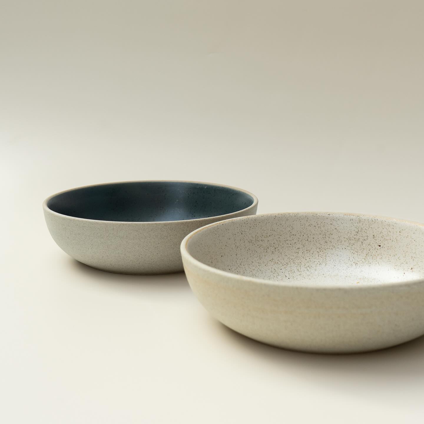 Discover our bestseller from the Night & Day collection: the Low Bowl which comes in two sizes. The versatile piece is perfect for any occasion. Crafted with premium porcelain and finished with our unique speckled glaze, find this in colours Midnight Blue and Daybreak.
#nightand day #tablewre #bowls #ceramics #porcelain #pottery #ceramicbowl #rusticglaze #quality #premium #plating #tablescape #donbellini #dining #handmade #dinnerware #modernceramics