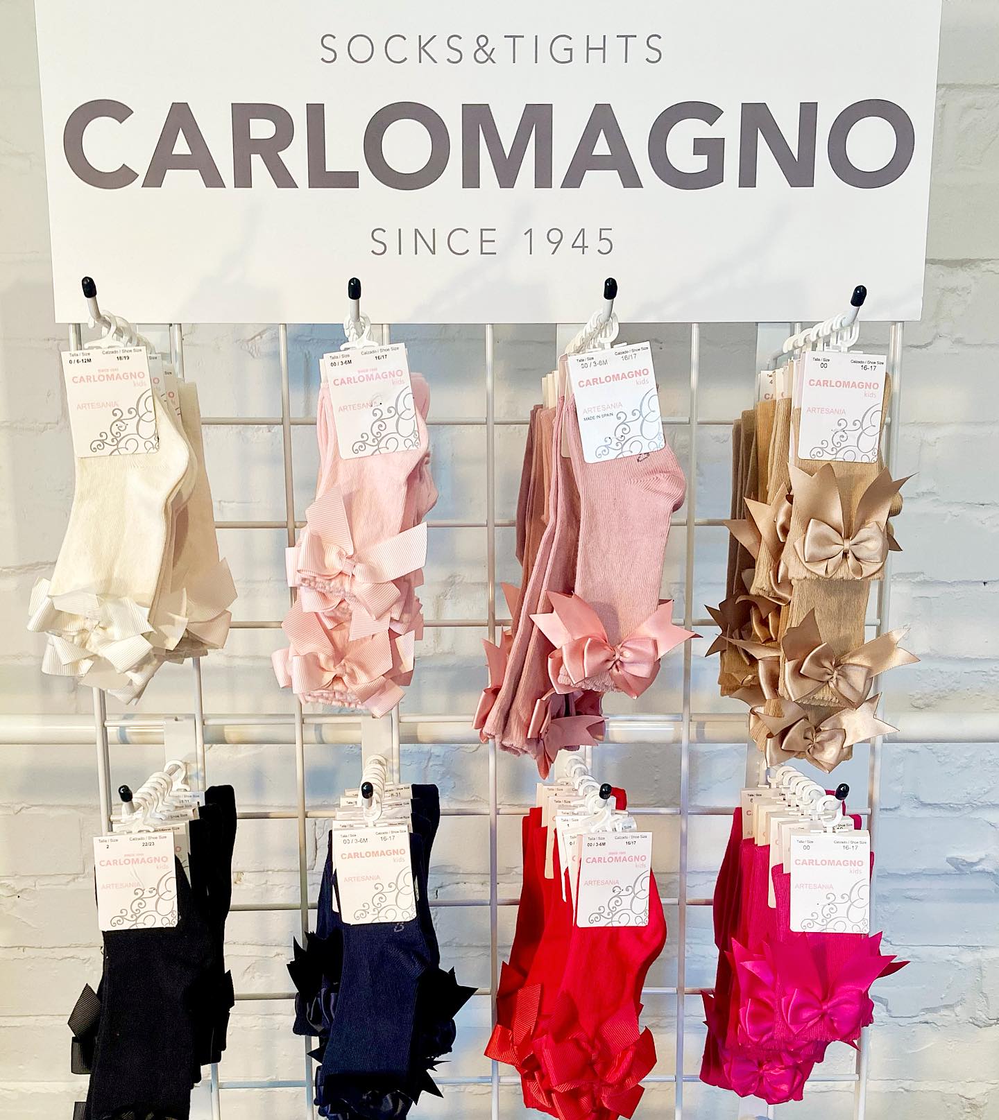 Carlomagno display stand Promotion! ⭐️ For orders with a minimum spend of 1,200euros, we will send a metal stand to clearly display your Carlomagno socks & tights. For more information - please contact us hello@tcgkids.co.uk @carlomagnosocks #promotion #socks #tights #kidswear #accessories