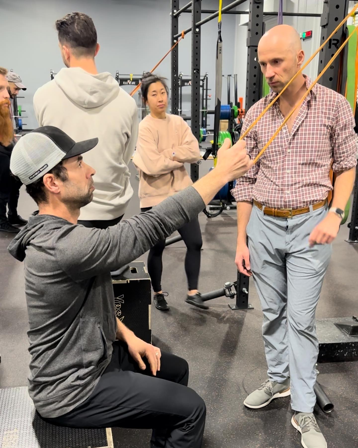 I just wrapped up the “Human Matrix” seminar from @zaccupples
The seminar presented a model of human movement based on fluid dynamics. It elegantly links skeletal shape to range of motion and performance, which means both “corrective” exercises and strength training reflect exactly what your body needs.
Here I’m doing three things:
1. Single arm lat pull-down under the watchful eye of Zac. It looks rather pedestrian, but the spine and rib position, seat height, and ground contact points are chosen to achieve particular outcomes.
2. Ramp goblet squat. I’m super vertical, which reflects my ability to expand posterior pelvic inlets. I don’t need more of this.
3. Frog breath with elevated uppers. Down force from knees and elbows drives internal rotation. Elevation puts more weight, compression, and internal rotation demands on my lower body. Since I’m starting from a relatively externally rotated position, this is a good position form folks that don’t have much internal rotation.
#strengthtraining #squats #breathe