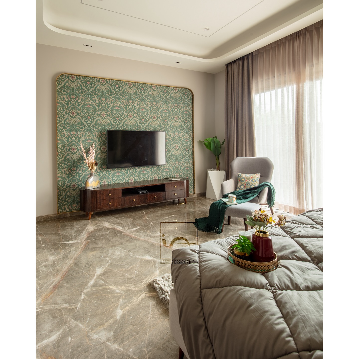 “Serene opulence”
This luxurious bedroom retreat embodies the perfect blend of natural elegance and sophisticated refinement.
The stunning green onyx back wall adds a touch of drama and luxury, its subtle sheen evoking the beauty of the natural world.
Italian marble flooring in sleek grey tones brings a sense of calmness and serenity, its creamy undertones complementing the rich green hues.
The harmonious balance of green and grey creates a soothing atmosphere, perfect for relaxation and rejuvenation.
Plush furnishings and accents in muted tones enhance the sense of luxury, inviting you to indulge in the finer things in life.
As the soft glow of backlit onyx dances across the room, the space transforms into a tranquil oasis, beckoning you to surrender to its serene allure.
In this luxurious bedroom haven, every detail whispers refinement, every element exudes sophistication, and every moment spent here is a testament to the beauty of understated luxury.
.
.
.
Designed @imagine_design_studios @architect.ankitmittal
Design team - @ar.deepesh_sharma @chandrikamittal
.
Location - Dahod, Gujarat.
@sumit_agrawal90 @sanket.sanket1988
.
.
#LuxuryBedroom #GreenAndGrey #OnyxWall #ItalianMarble #SereneOasis #BedroomGoals #InteriorDesignInspiration #nilayawallpapers #asianpaints #sabyasachiofficial #greenonyx #bedroominteriors #bedroominteriordesign #bedroominteriorstyling #interiordecor #interiorstyling #indorearchitects #interiordesigner #archlovers #archdaily #architecturelovers #interiorphotography #postoftheday #instadaily #explorepage✨