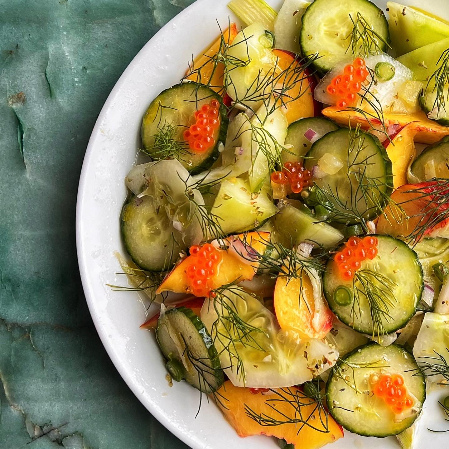 Assortment of cucumbers, smoked trout roe, nectarines, shallot, green beans, calamansi LSK vinaigrette, dill