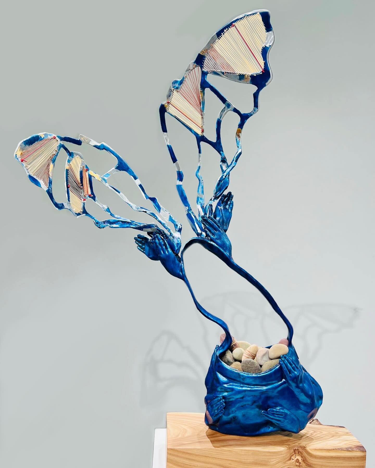 “Lift and Carry” is currently on display at JKR Gallery in Provo, UT, as part of the @certainwomenartshow
I’m honored to be a part of this amazing all-women’s exhibition that runs through June 7th.
This may seem like a just small piece in a big show. But for me it has been monumental to come back after hip surgery and still participate. I could not have done it without the help and literal lifting of mentors, friends and family.
Here is my artist statement for this piece:
We carry the hopes of our children and the dreams of our ancestors.
In our baggage hides the grisly, mascara-stained tissues of failure and trauma.
Tools for survival are interwoven amongst the trappings of our day,
waiting for a stray piece of gum to stick to them.
We clutch the thrill of accomplishment.
We are tied to commitments, relationships, and the desire to measure up.
We pack our past, and it makes bruises on our shoulders.
Sometimes, we see someone whose baggage is so heavy they cannot carry on;
so, we unpack theirs,
and squeeze more into our bag…
and realize…
it weighs less.
Lift.
For me, I am lifted by both weight and wings.
#handbag #aluminumsculpture #castaluminum #sculptnouveau #emotionalbaggage #traumarecovery #manyhandsmakelightwork #lifecast #jcccfinearts #certainwomenart