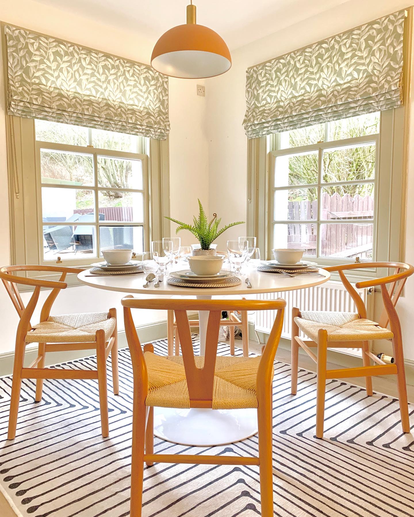 I’ve been delving into the archives today and stumbled across these photos of a project I completed last year. Set in a beautiful rural location, this Victorian lodge was in a need of an update before my client moved in. The budget was tight, so I chose budget friendly brands such as Zara Home, Ikea, H&M Home, and Dunelm for most items but splurged on a few things such as the pendant light in the dining room from Ferm Living. I think this really elevates the overall feel and also introduces a little splash of pink (always a good idea in my book 😊)
I suggested we paint all the woodwork (skirting boards and windows) throughout the property in a pale, soft and natural green colour. All the woodwork was previously pine so felt a little dated, painting it really transformed the whole property without breaking the bank. Never underestimate the power of paint, I think it’s the biggest game changer.