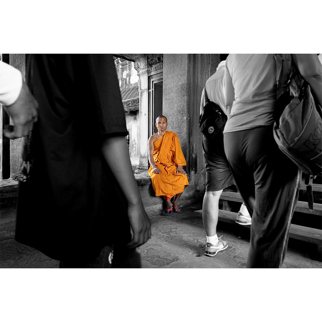 I get the feeling that the monks here are somehow just as bewildered when observing us tourists as we are looking at ancient ruins. This monk was just sitting there observing a constant flow of tourists as they flooded past him. It seemed like he was watching us exploring and taking loads of photos but not actually being present and just appreciating the marvel of the holy site before us.
.
.
.
.
#angkorwat #angkor #angkortemples #templescambodia #travelcambodia #explorecambodia #thisiscambodia #travelphotography #explorephotography #capturethemoment #capturecambodia #travelgram #thisiscambodia #siemreap #visitsiemreap #ruins #ancientruins #ancientruinscambodia #12thcenturyruins #canonphotography #canon_photos #monk #monkcambodia