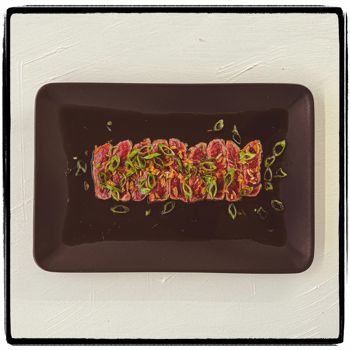 #starter was a #beeftataki tender sirloin steak served with a bright citrusy ponzu sauce paired with this “Beffroi du Barrail Saint Emilion AOC”. Get the recipe on our website.
#dinnerparty #appetizer #instafood #japanesefood #searedsteak #foodie #foodphotography #homemade