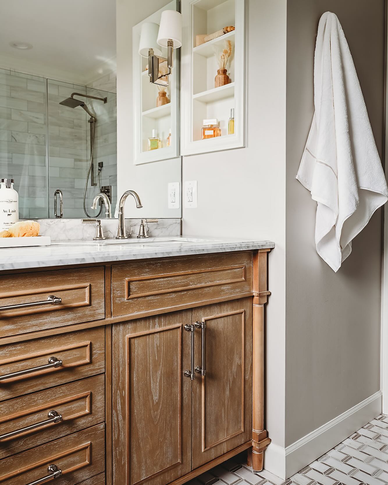 Demo has officially kicked off on our latest main bathroom redesign so thought we’d share this beauty from our #transitonalfarmhouse project last year.
We’re keeping things neutral again in this project but bringing in darker wood tones and pops of gold. See the progress in our story!
If you’re planning or thinking about a home renovation, we’re sharing our top reasons for working with a designer first in our latest blog. 🔗 in profile.
#hillhousedesignmd #bathroomredesign #luxurybathroom #marylandinteriordesigner #classicbathroom #neutralbathroom #woodvanity #renovationtips