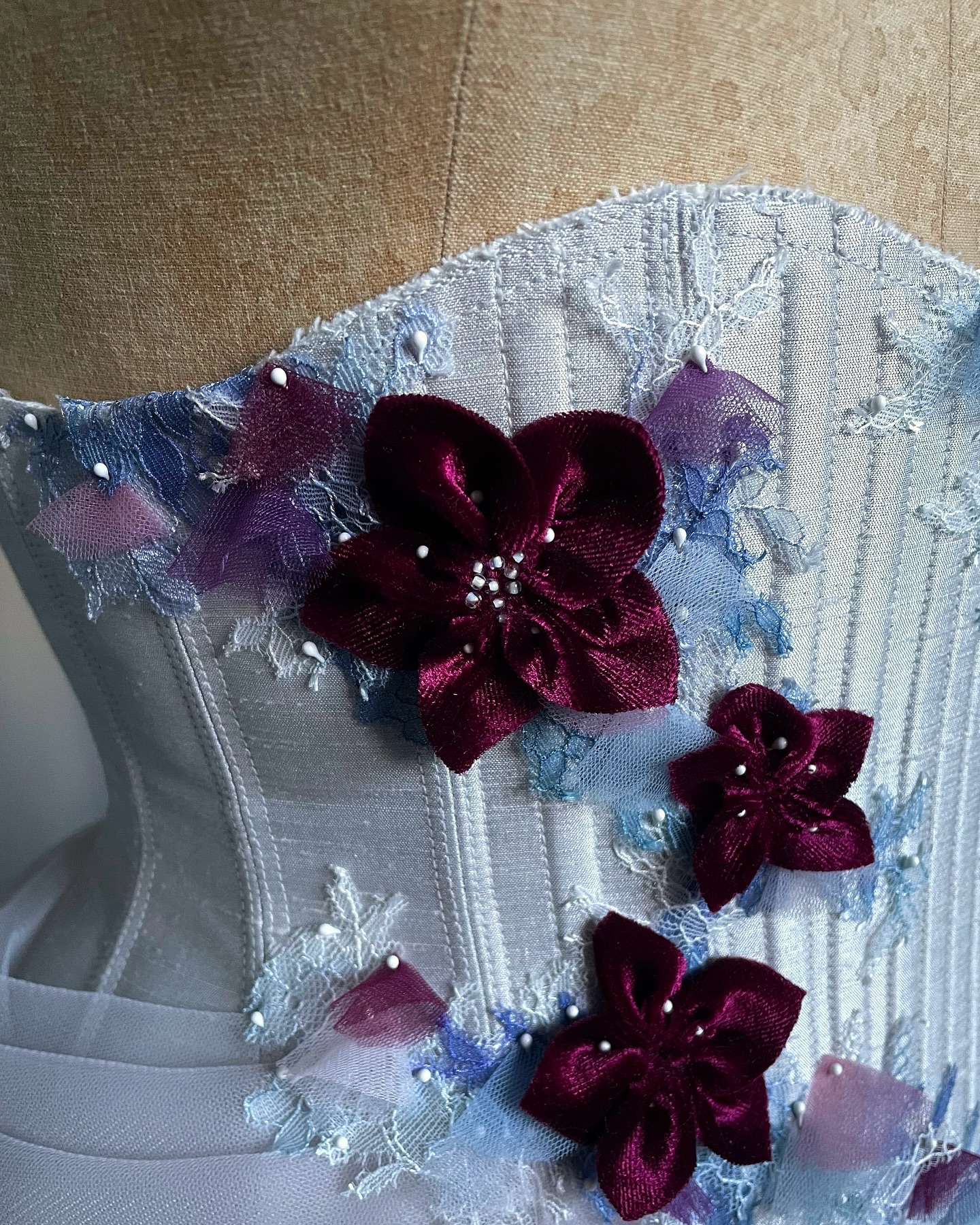Textures...
The colours on this piece are just gorgeous! Pale blues and lavenders with hand painted lace and pops of velvet cranberry…
I can’t wait to complete it for my lovely client next year!