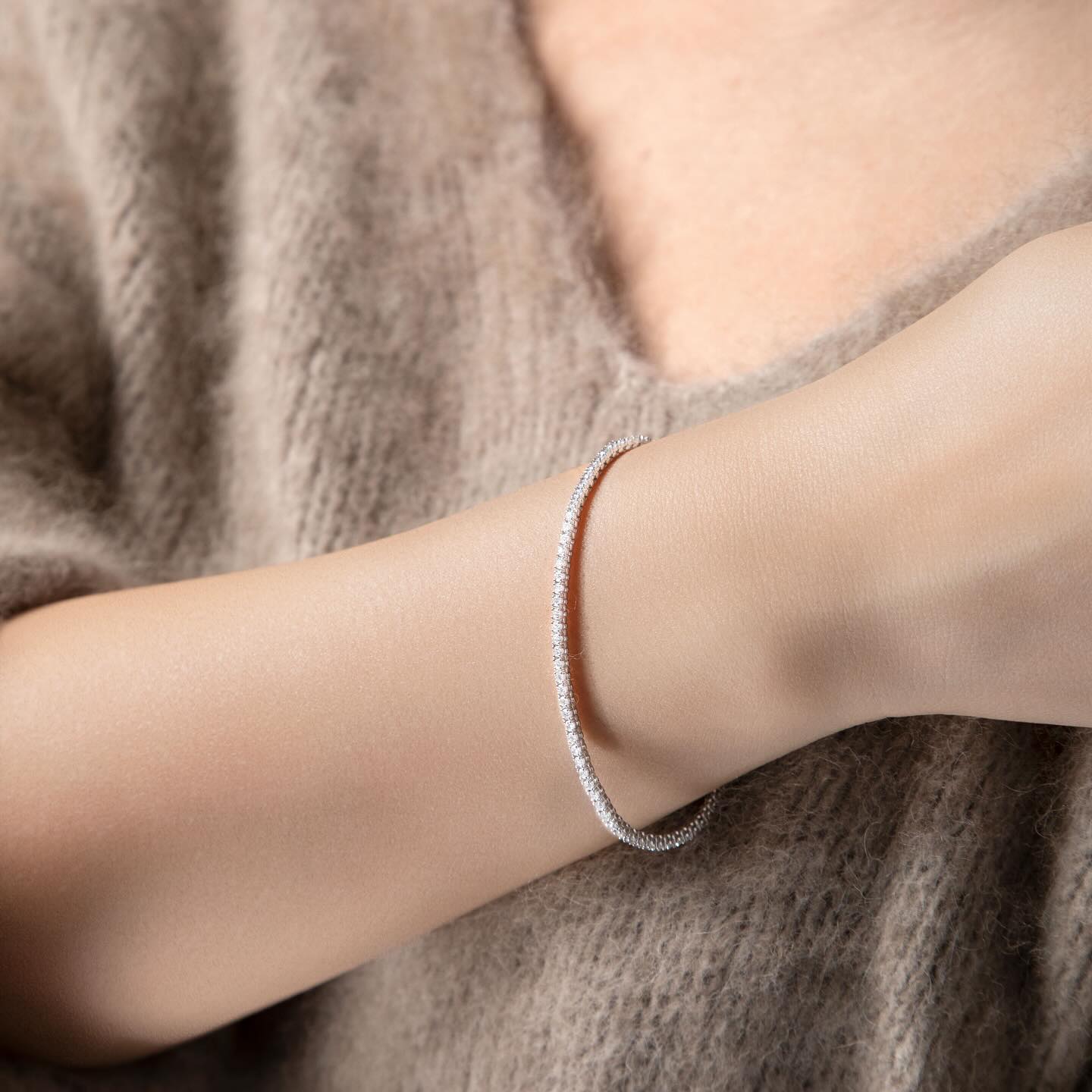 Embrace History's Sparkle: Our tennis bracelet, a testament to elegance, embodies a rich legacy that originated from tennis icon Chris Evert's dazzling mishap at the 1987 U.S. Open. Adorned with radiant diamonds, this timeless piece perfectly captures the allure of a continuous row of brilliance.
Add this tennis bracelet to your collection and let these diamonds illuminate your every occasion. Available in custom lengths and sizes.
#TennisBracelet #diamonds #labgrowndiamonds #SparklingDiamonds #TimelessElegance #diamonds #timelesselegance #sparkleandshine #jewelryhistory #luxurybracelets