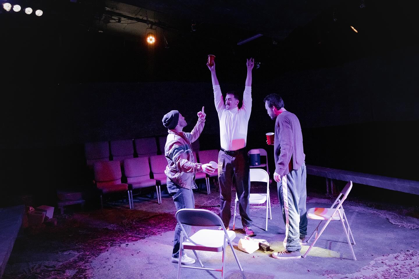 SPEAR (2024)
By CN Smith @cn.smith
Corrib Theatre at 21Ten Theatre — Portland, OR
@corribtheatre
—
Cast:
Sean – Rocco Weyer
Joe – Ryan Edlinger
Nate – Dylan Hankins
Team:
Writer – CN Smith
Director – Joy Nesbitt
Producer – Holly Griffith
Set Design – Kyra Sanford
Lighting Design – Jeb Stuart
Costume Design – Viola Horton
Sound Design – Jonathan Castillo
Stage Management — Colin Herring
Dialect Coach — Karl Hanover
—
White fragility simmers in the wake of Black success.
Three white Irish men meet at their childhood athletic field to catch up, drink, and discuss the recent Olympic success of their former Black friend, Amir. Their vulnerabilities, jealousies, and perceived failures seethe below the surface as they recall their teenage years. In a parallel reality, the young men wrestle with flashes of the past when they enact scenes from Amir’s diary.
Spear is supported in part by a grant from the Irish government’s
Emigrant Support Programme
Corrib Theatre’s mission is to bring Irish playwrights’ unique perspective on oppression and empowerment, and conflict and resolution, to Portland in order to change our world for the better.