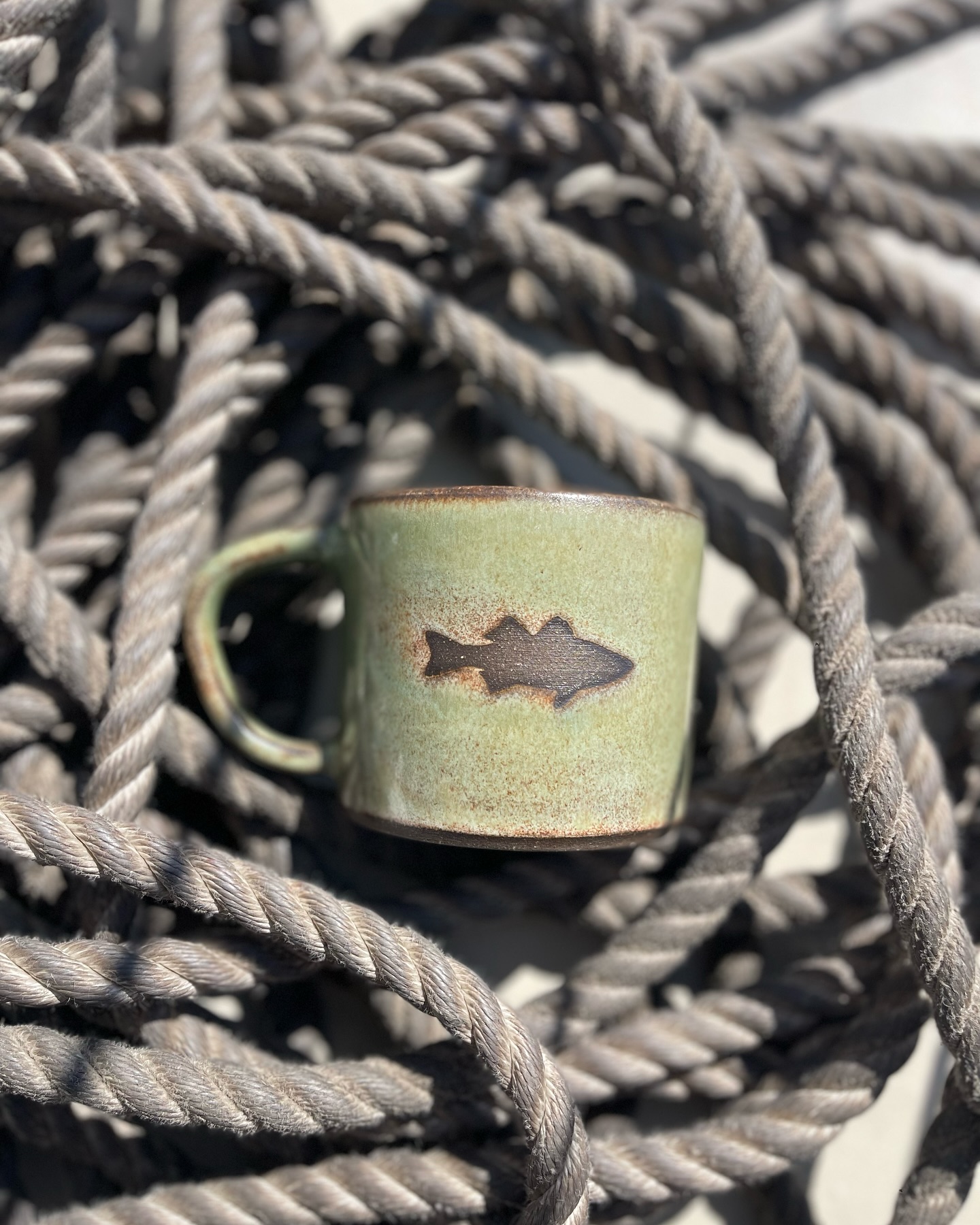 This project didn’t go as planned…but I’ll take it! After a mix up in clay colors, fish mugs were born