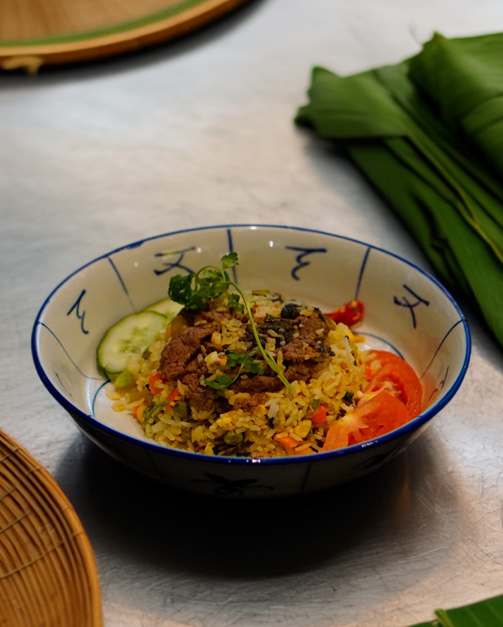 Beef fried rice, but make it Vietnamese! Our Cơm Chiên Dưa Bò brings together savory beef, fragrant rice, and tangy mustard greens for a dish that’s anything but ordinary! 🥩🍚