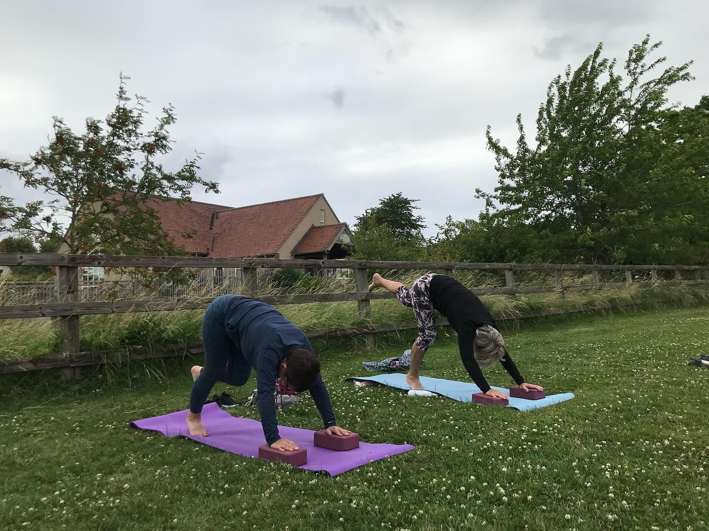 Hardcore yogis doing it on the field tonight. It was grey and windy but we pretended it was summer! Thank you for humouring me and not moaning too much about the cold!! #fieldyoga #overburylife #overburyyoga