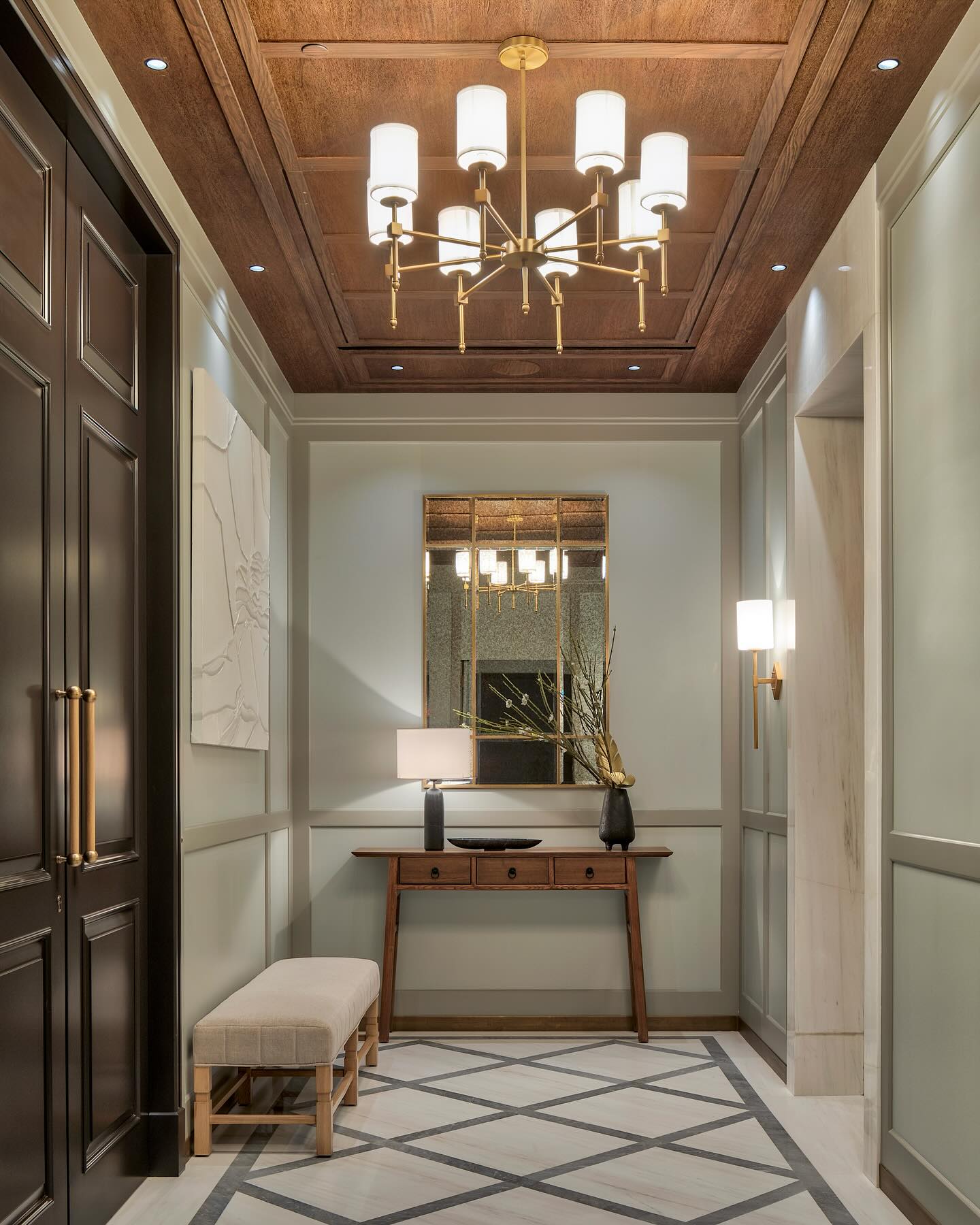 Step into the soulful heart of Casa Three Sixty 🏡✨ This private lift lobby is a "stop and stare" moment where timeless grandeur meets high design.
The custom panelled millwork blends gracefully with elegant marble details, creating a warm and inviting vibe. Dark woodwork and brushed brass accents add a touch of our studio's signature style, merging seamlessly with the room's serene palette of greys. Come immerse yourself in the details and discover the luxury that defines our design philosophy.
#InteriorDesign #LuxuryLiving"
Project: Casa Three Sixty
Interior design and styling: @casa_novo
Photography: @pulkitsehgal7