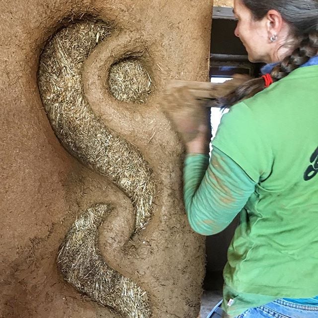 I want to demystify clay plaster a bit...
At it's most basic, clay plaster contains 2 simple ingredients:
clay (the sticky binder/glue)
& aggregate, such as sand (reduces shrinkage cracking & improves compressive strength).
Once wet, clay is malleable.. It becomes strong & hard as it dries out.
Other additives:
There are so so so many things you can add to clay depending on what you are trying to do with it. Here are a few of the most common ones, along with why you would use them.
**fiber - gives you a support network inside your plaster...like a woven fabric integral in your plaster. Any dried fiber that is pliable & not super smooth will work: straw, hemp fiber, sisal, palm fronds, hay, etc.. The more fiber you add, the more flexible and gravity-defying your plaster becomes. I use up to 50% fiber in sculpting plasters
*horse manure - easy way to add chopped fiber to your plaster
*cow manure - adds some fiber & some stickiness. Cow manure helps strengthen silty or weak clays. Plus the magic of cow manure is an enzyme that helps any plaster improve resistance to erosion from water. So it's a great additive for exterior plasters, plasters in wet areas, or clay floors.
*wheat paste - flour boiled in water to create a thickener. (Other starches work as well) Wheat paste adds stickiness, so helps to improve weak clays, & is often used to prevent dusting in finish plasters.
Where best to use?
Clay plaster is super versatile, however, there are 2 issues to keep in mind:
1. clay needs to dry fully to become strong
2. clay is prone to erosion if exposed to weather
So make sure plaster in wet areas have time to dry in between usage. If you use clay plaster as an exterior finish, make sure you have nice deep roof overhangs & expect some erosion anywhere that rain can consistently hit the walls.
Most important: test your recipes!!!
Every clay is different so to find the best recipe for your clay, do ample testing!! If your dried test plaster cracks, add more fiber and/or aggregate. If your dried tests are dusty, add more clay.
#DIY #howto #demystify #clayplaster #naturalbuilding #buildlikeyougiveadamn