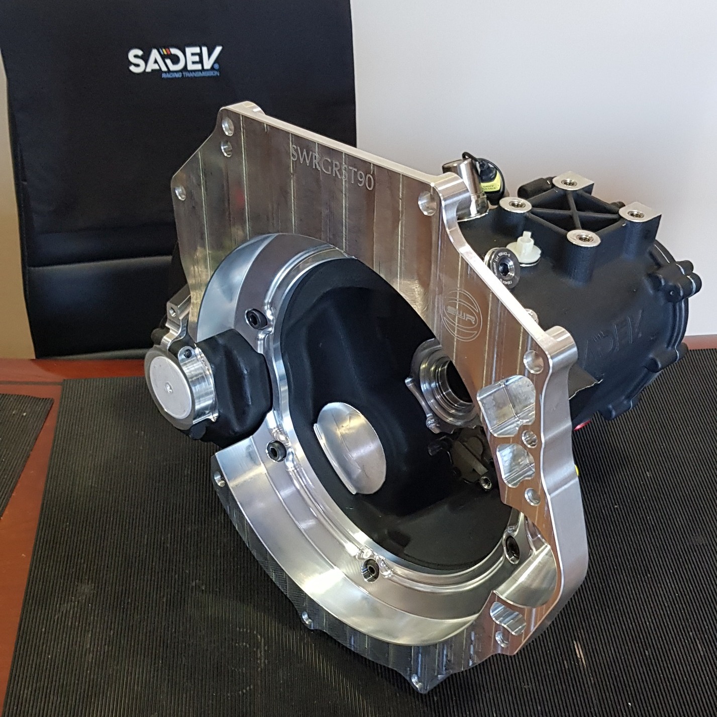 This is a dummy casing for Sadev's ST90-17 sequential box - the strongest in their 2WD transverse range - mounted with an SWR in-house designed and machined adaptor plate to fit a customer's punchy 3-cylinder Toyota G16E-GTS engine out of the GR Yaris. This is all going away to be fitted to the car and have mounts and measurements made up for everything to fit in the engine bay just right. 👌😄
#SWRMotorsport #SADEV #Transmission #Gearbox #racing #competition #motorsports #sequential #motorsport #engineering #bespoke #cncmachining #aluminium #CNC #design #machining #TOYOTA #toyotayarisgr