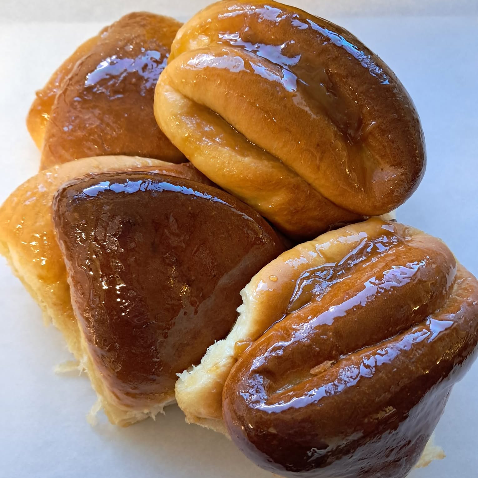 The glazed butter buns are fresh out of the oven!